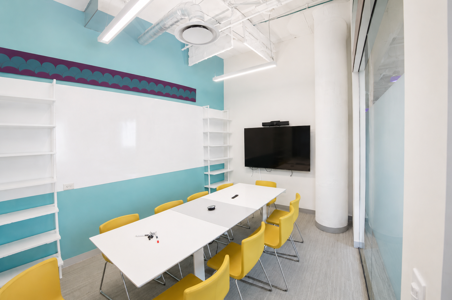 Modern Furnished Office with Natural Light and Seaport Views