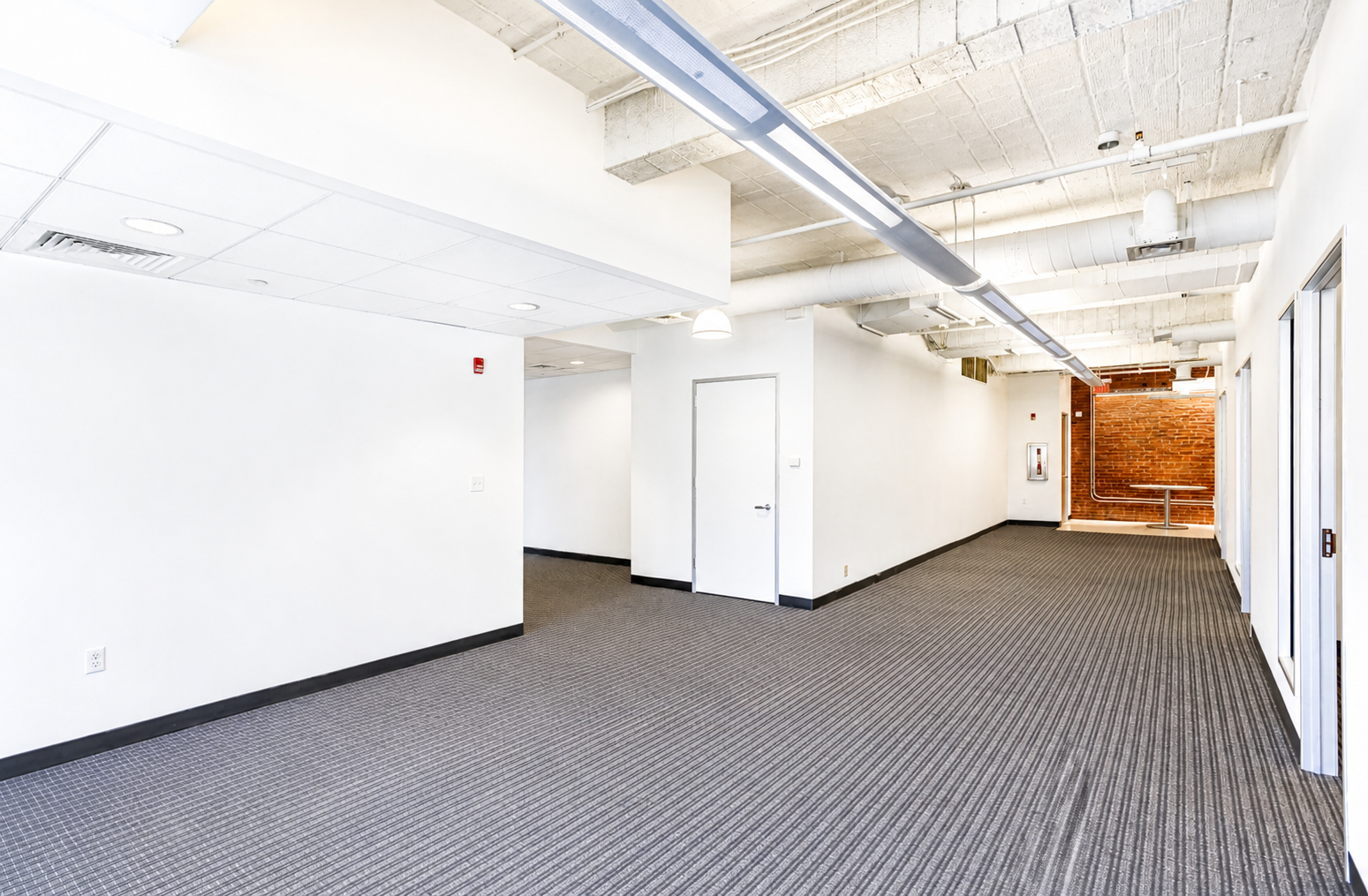 Chic Brick Office with Natural Light in Downtown