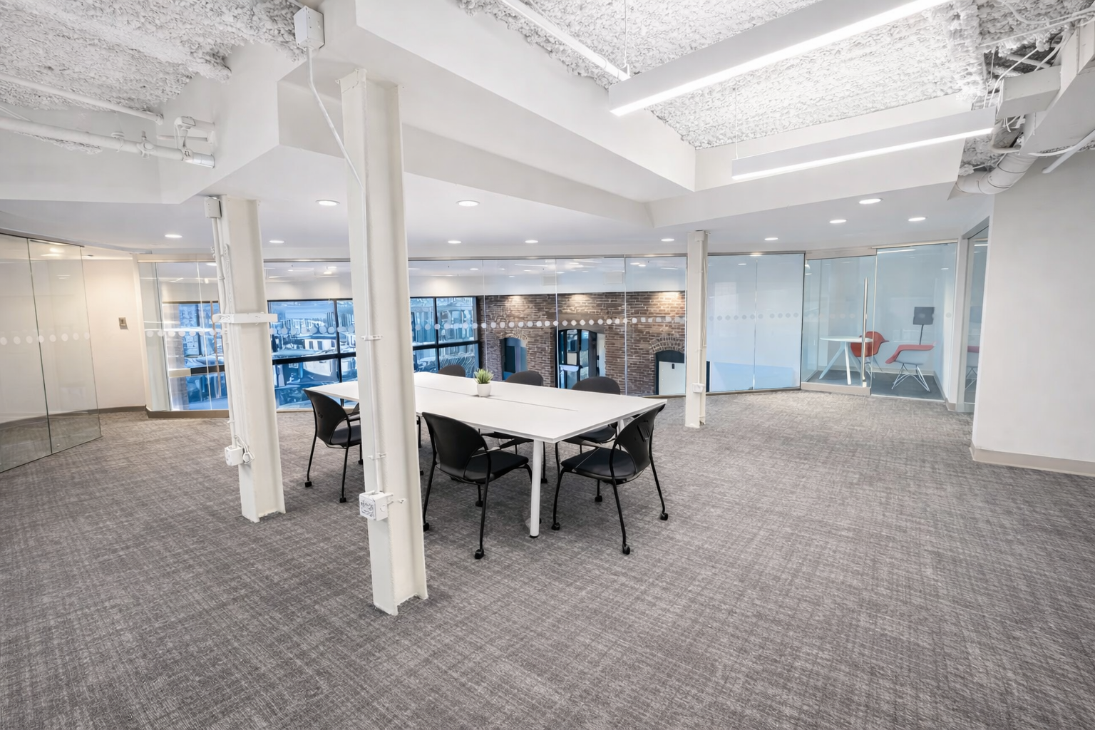Modern Workspace with White Brick in Vibrant Seaport