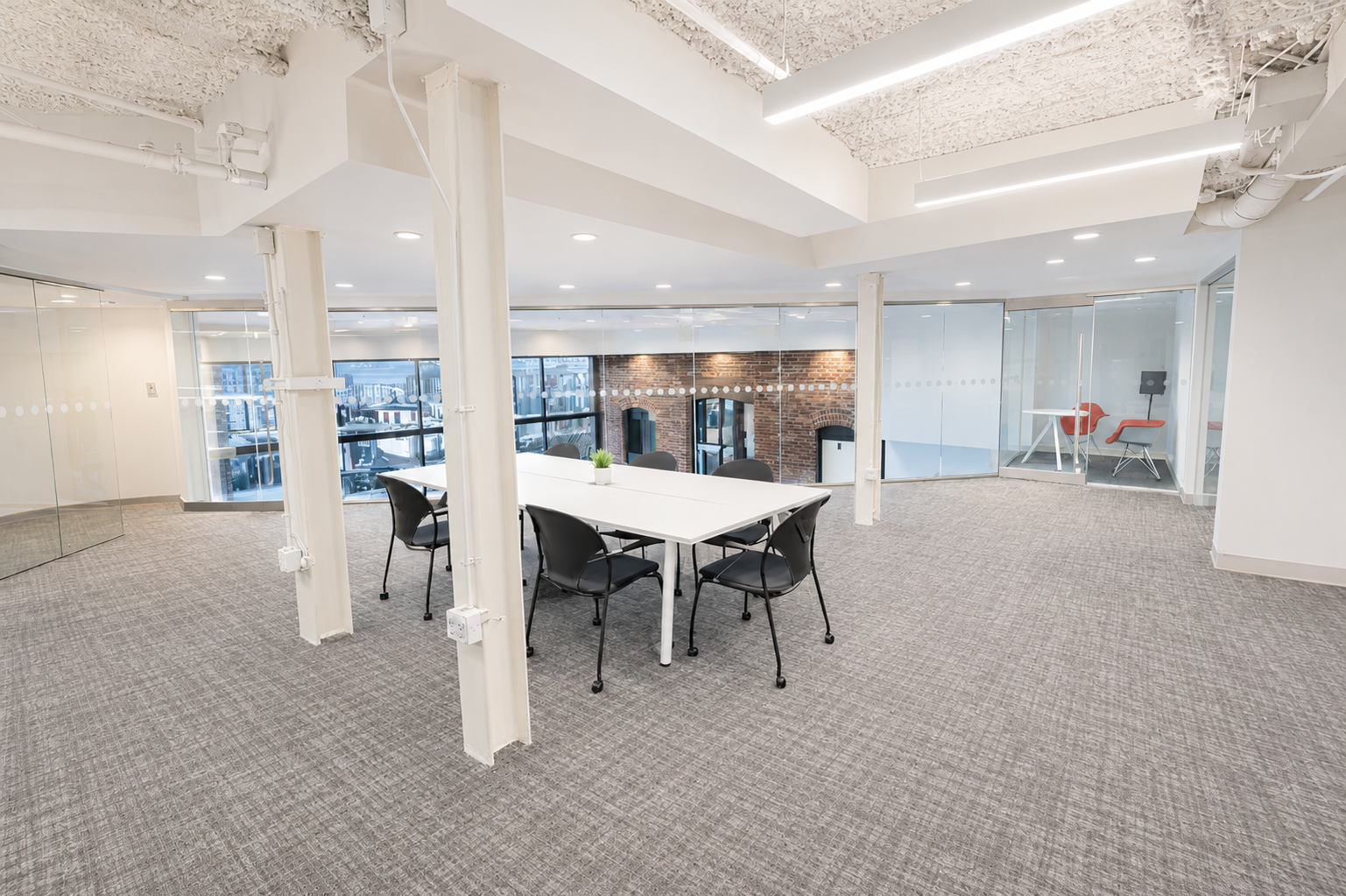 Modern Workspace with White Brick in Vibrant Seaport