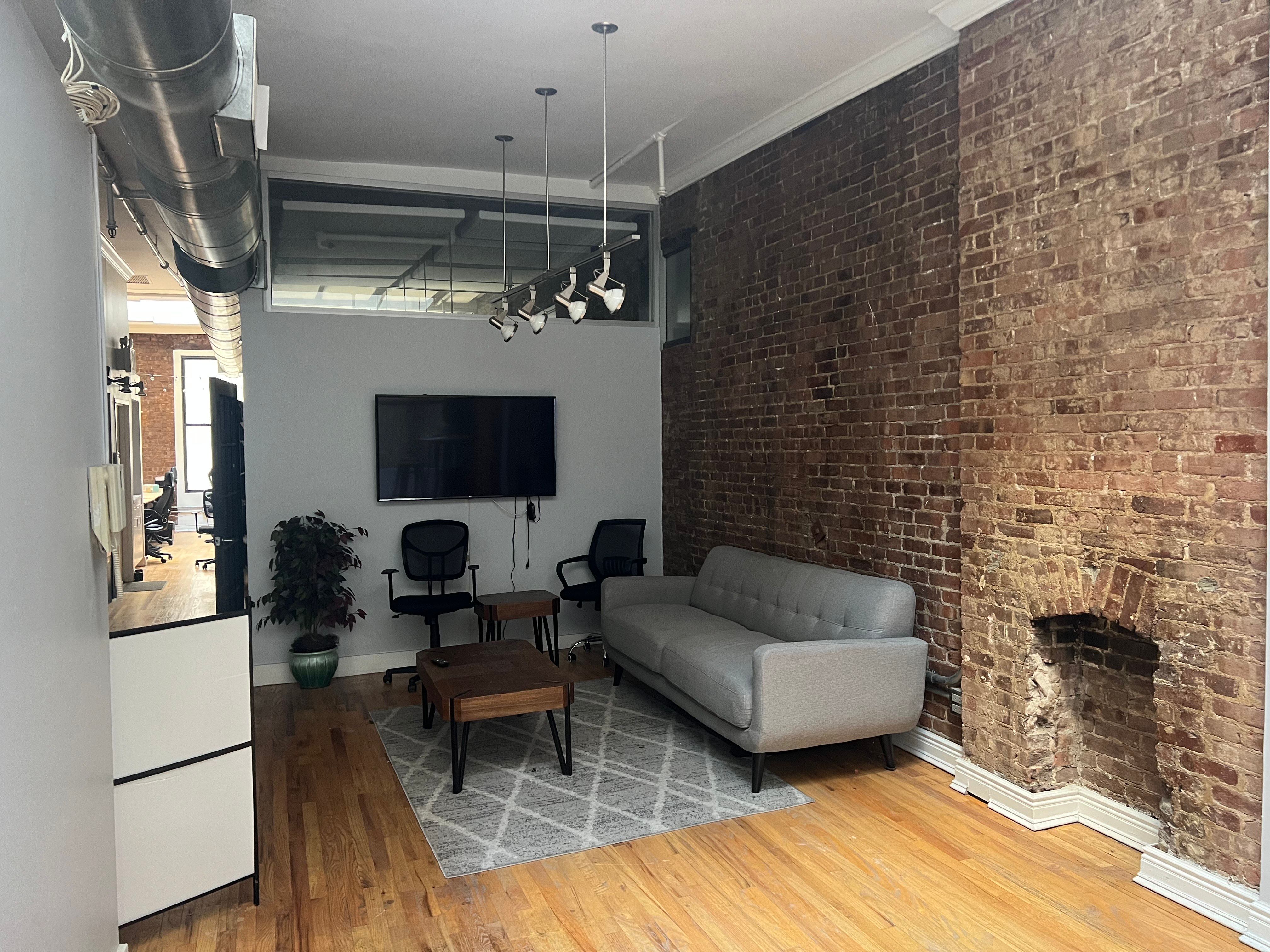 Creative Midtown Office with Exposed Brick and Plants