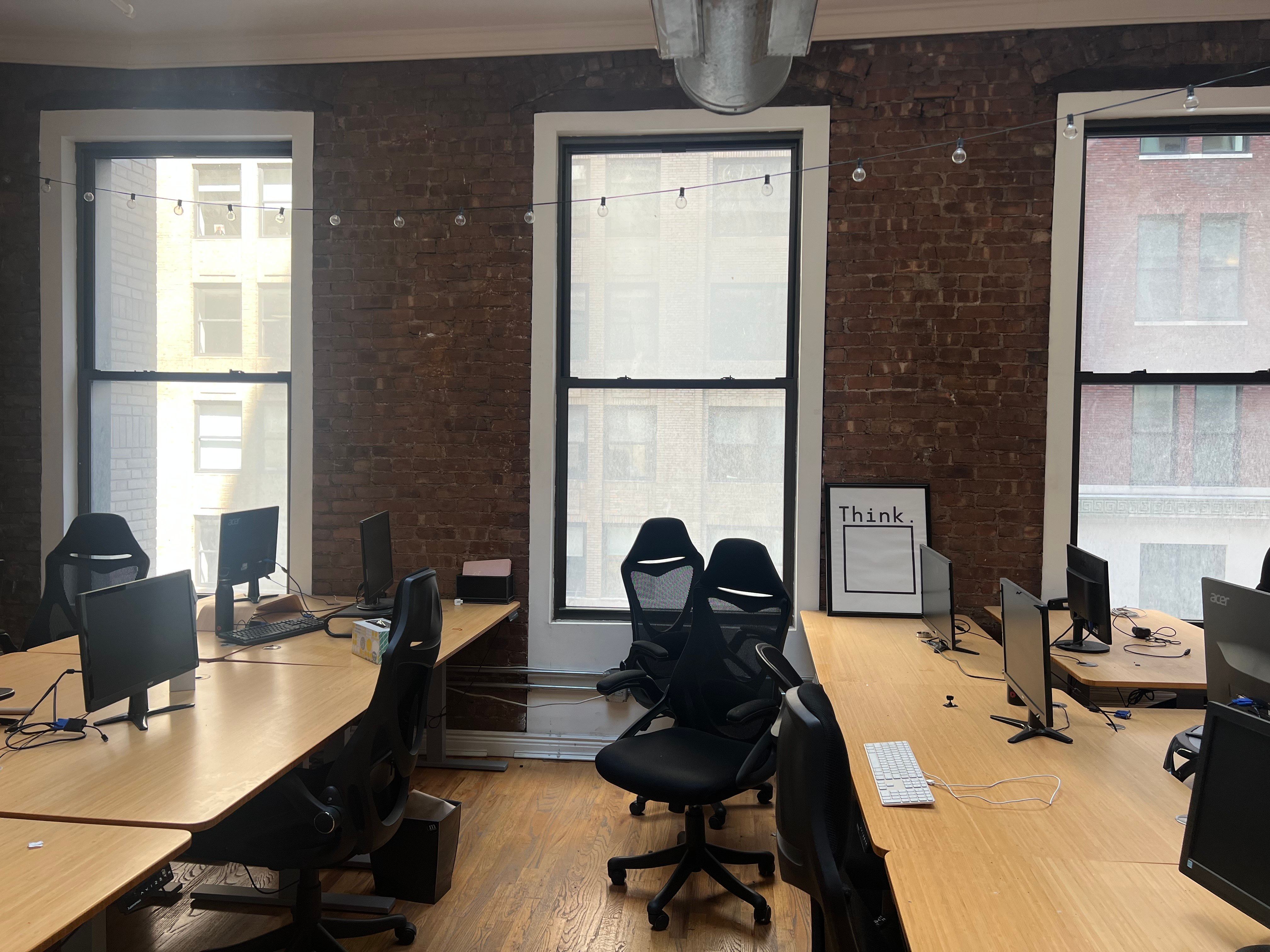 Creative Midtown Office with Exposed Brick and Plants