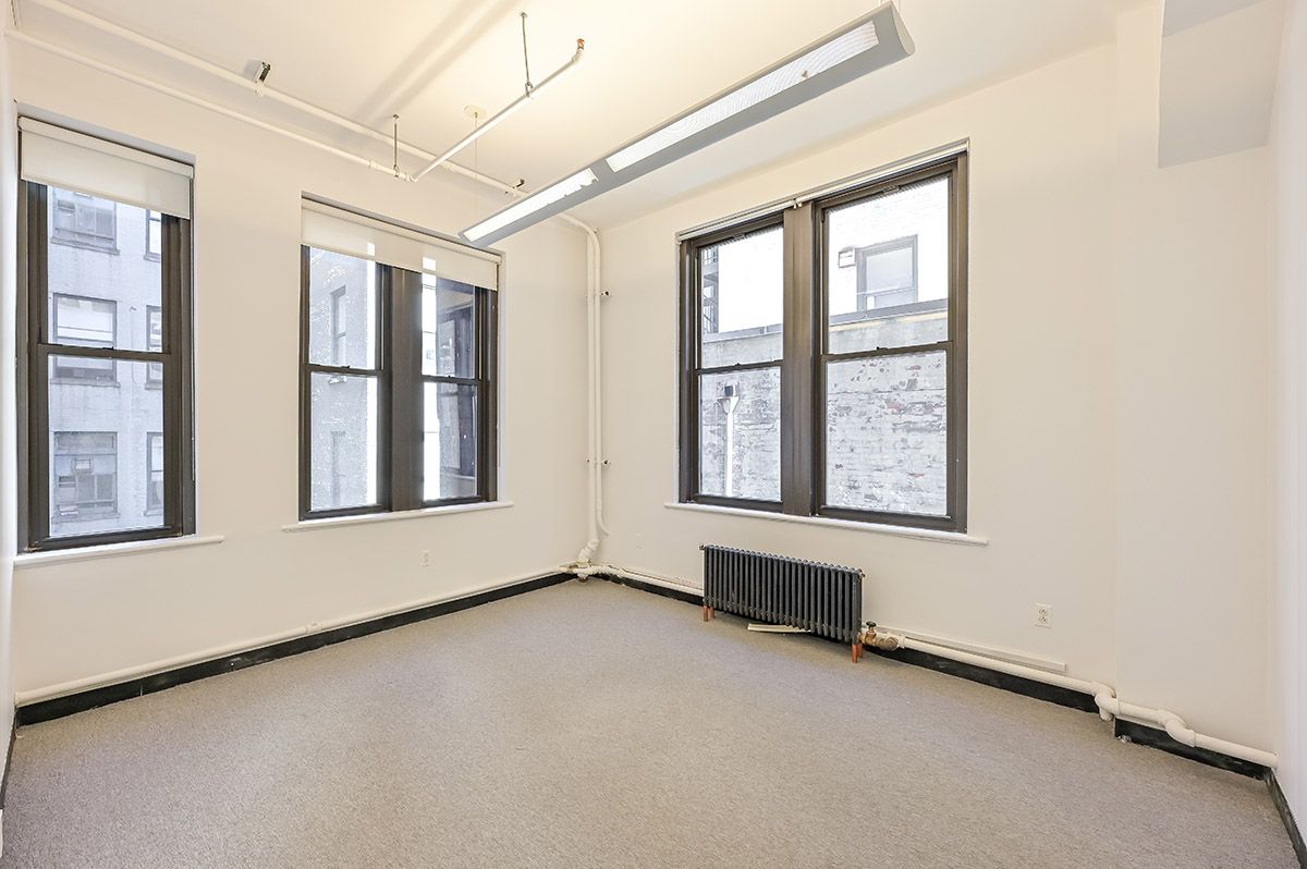 Bright Corner Office with Windowed Private Office