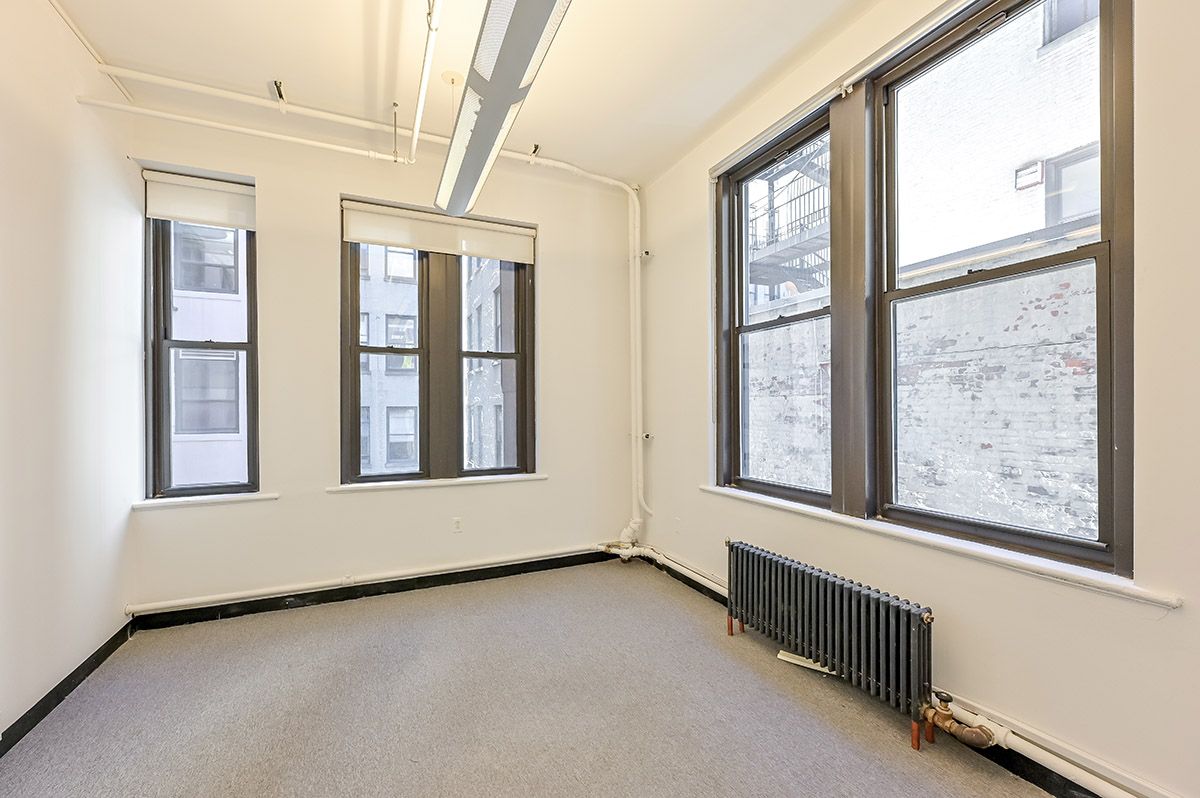 Bright Corner Office with Windowed Private Office