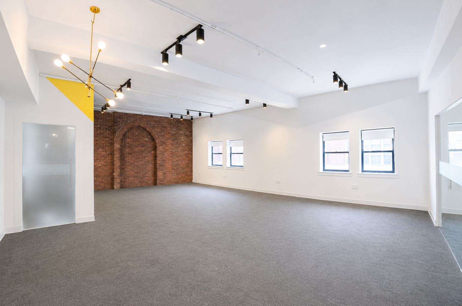 Modern Brick Office with Natural Light in Downtown