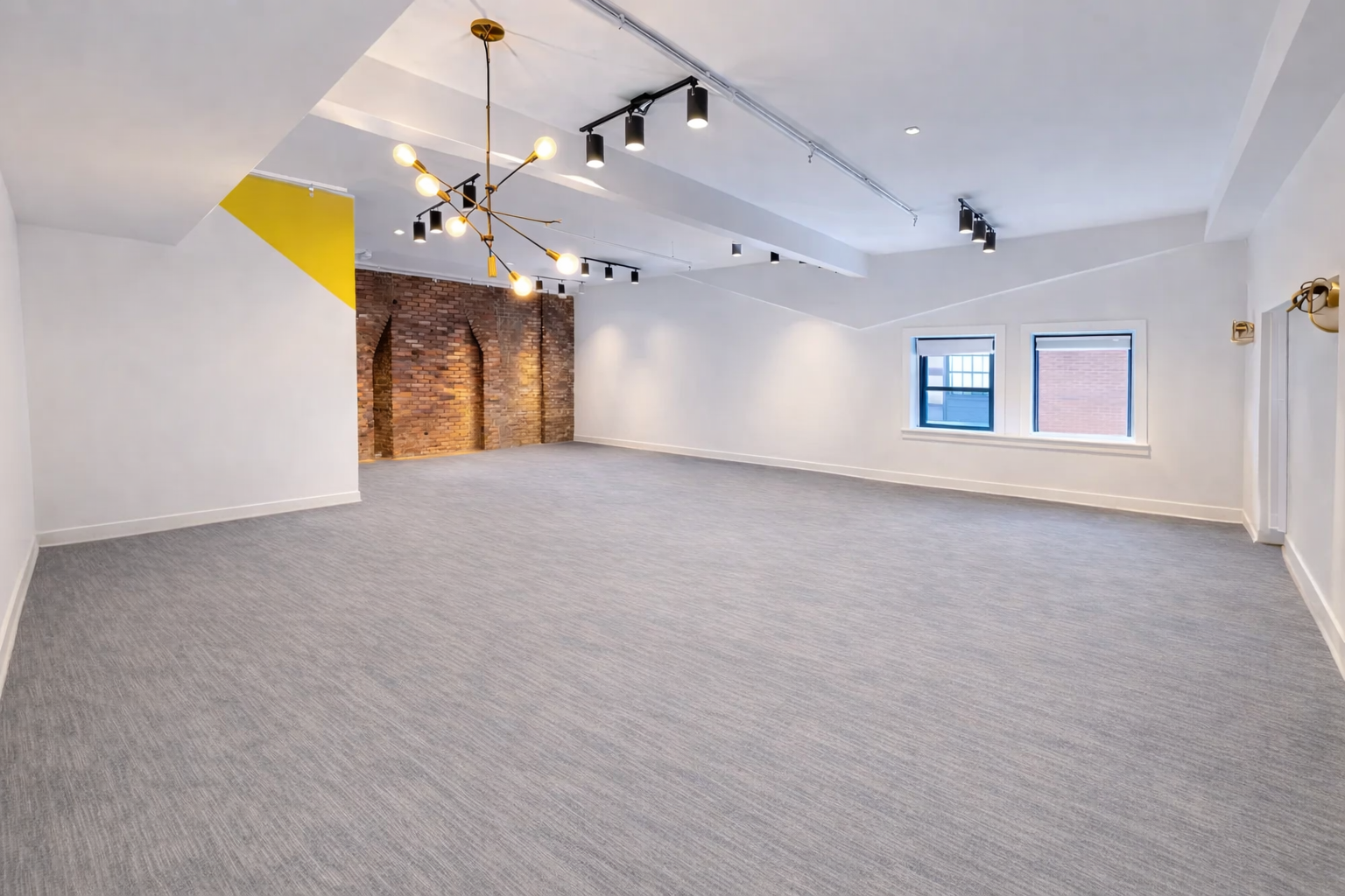 Modern Brick Office with Natural Light in Downtown