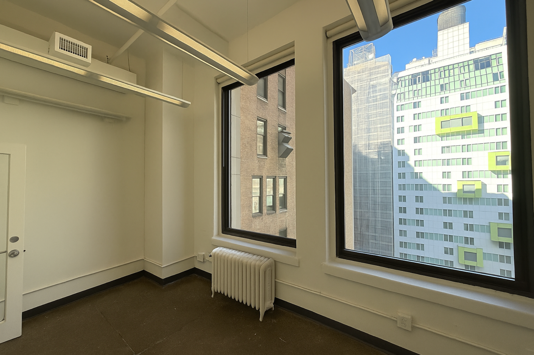 Versatile Midtown Suite with Open Space & Concrete Floors