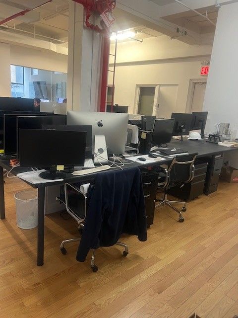 Airy Office with Brick Walls and Natural Light