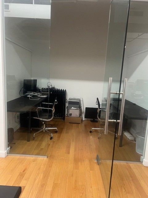 Airy Office with Brick Walls and Natural Light