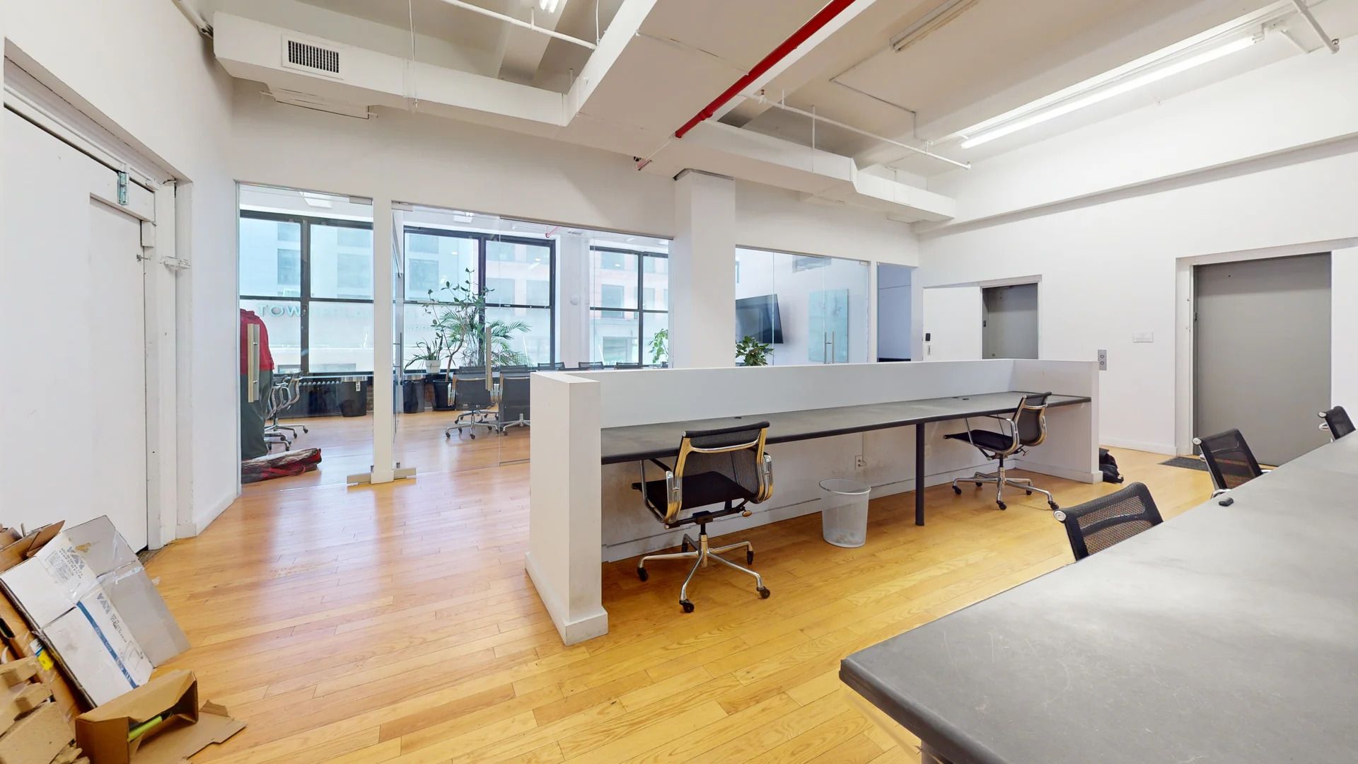 Airy Office with Brick Walls and Natural Light