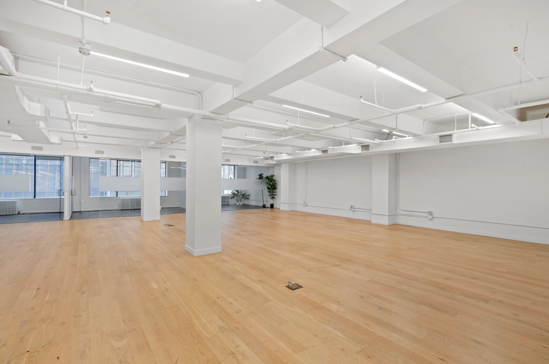 Modern Midtown South Office with Glass Conference Rooms