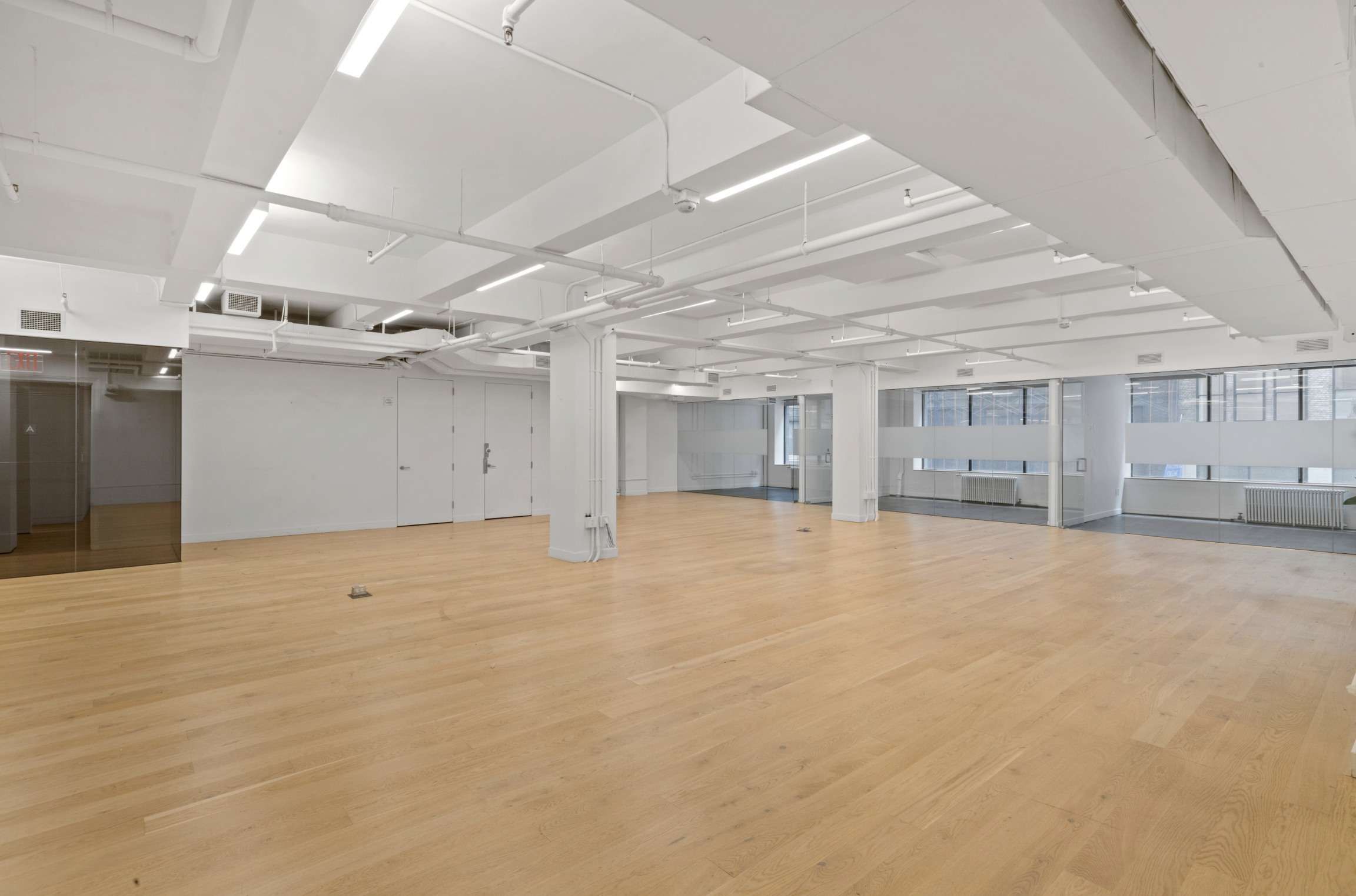 Modern Midtown South Office with Glass Conference Rooms