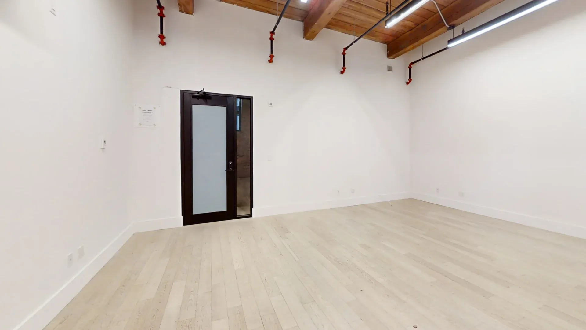 Airy Brooklyn Office with Exposed Brick and High Ceilings