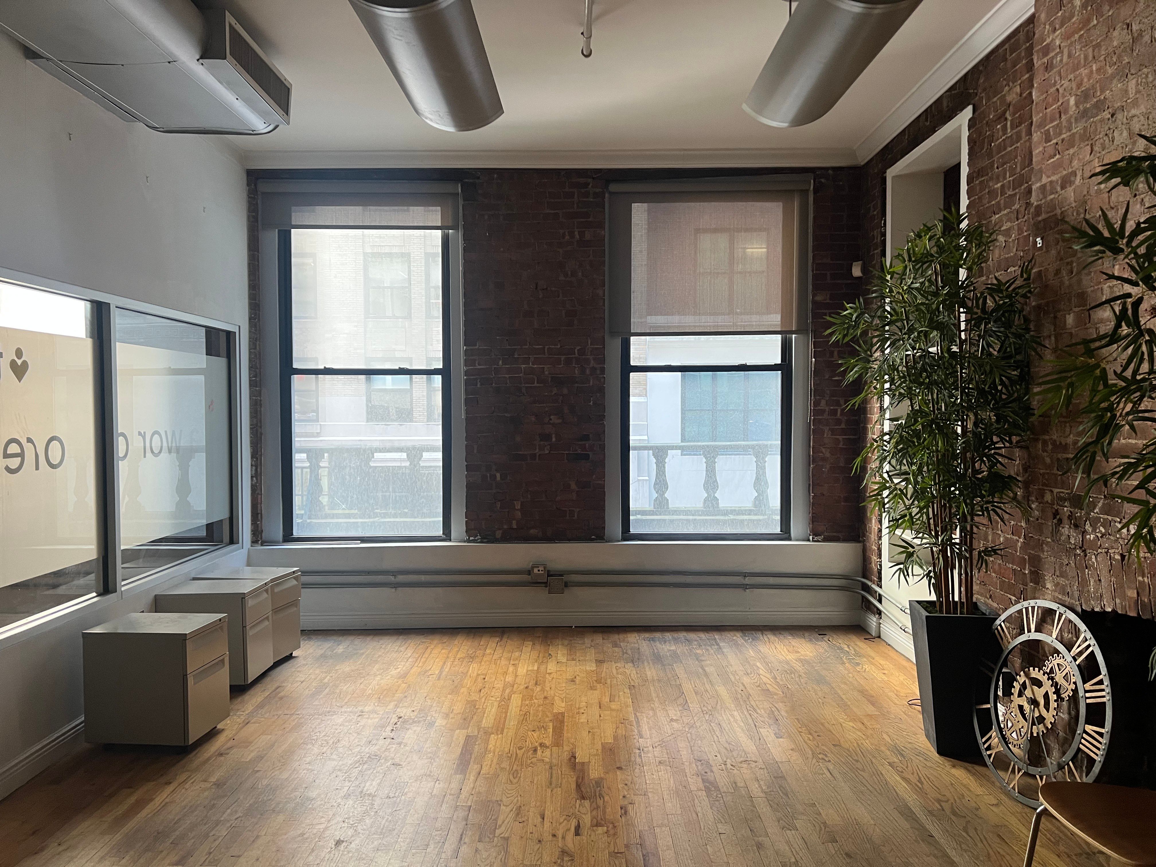 Airy Midtown Office with Artful Finishes