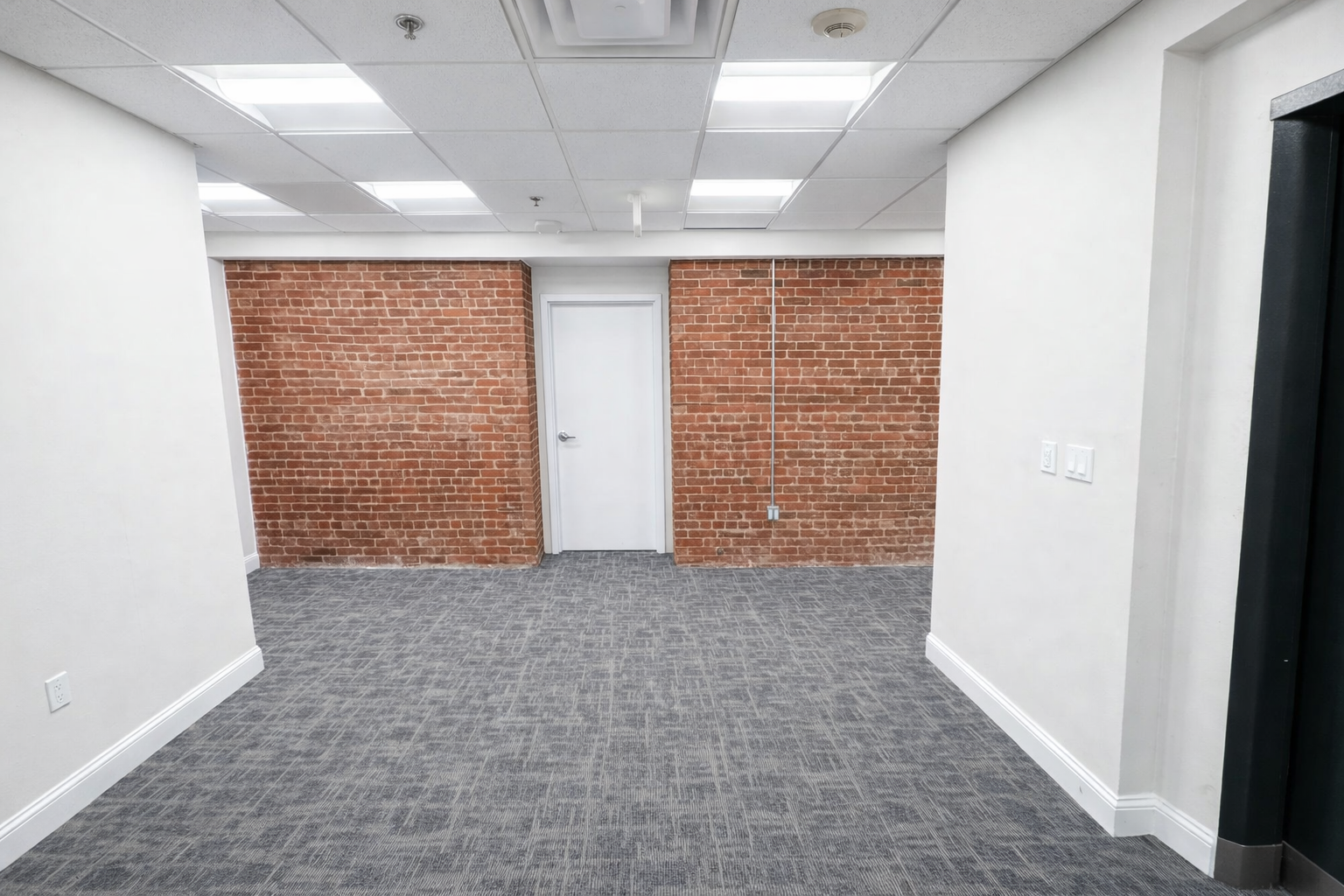Private Downtown Office with Brick Finish & Floor Amenities 