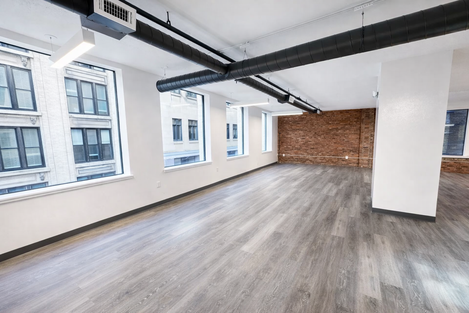 Bright Downtown Boston Office with Exposed Brick