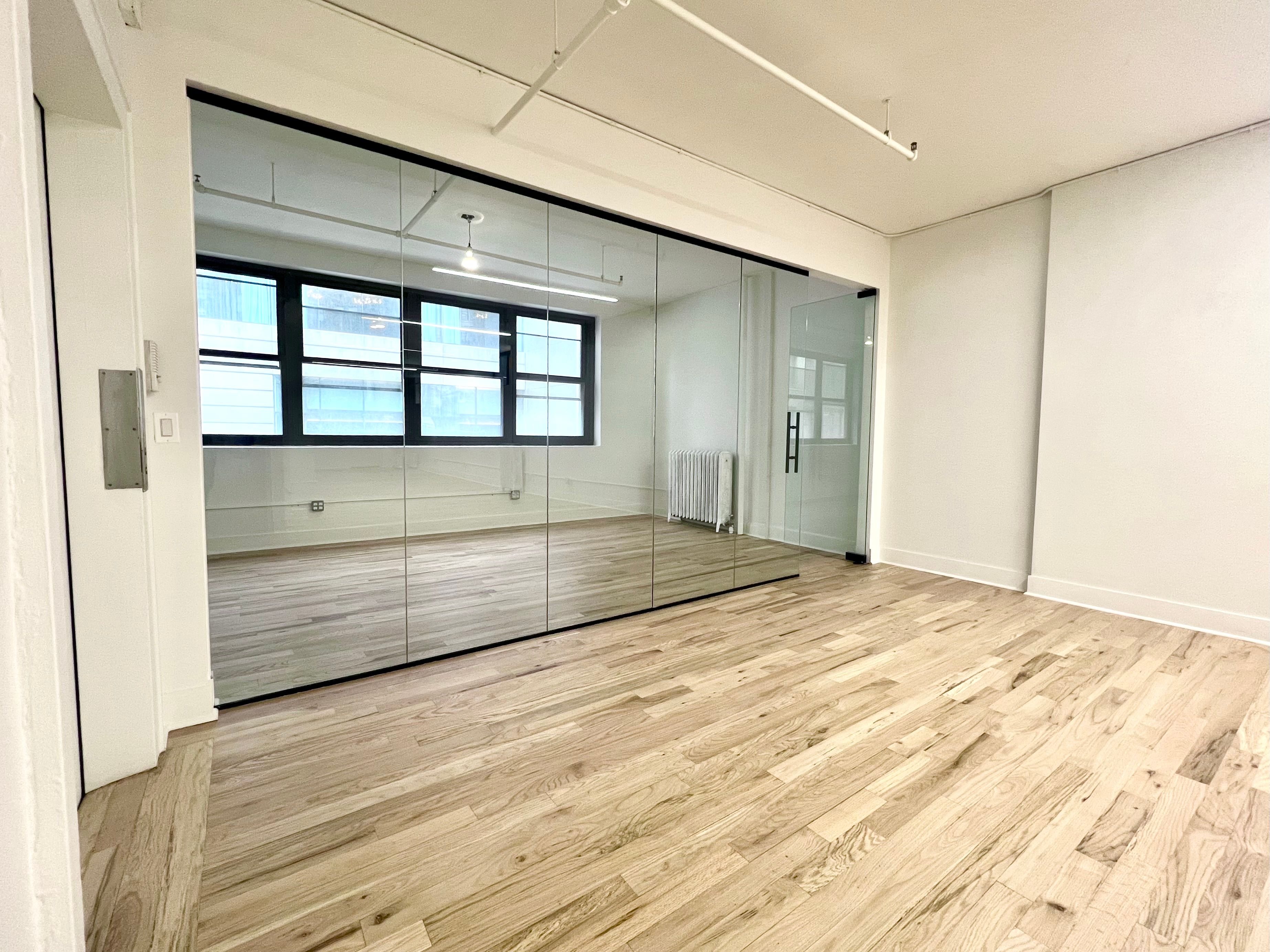 Light-Filled NoMad Office with Glass Meeting Room & Kitchen