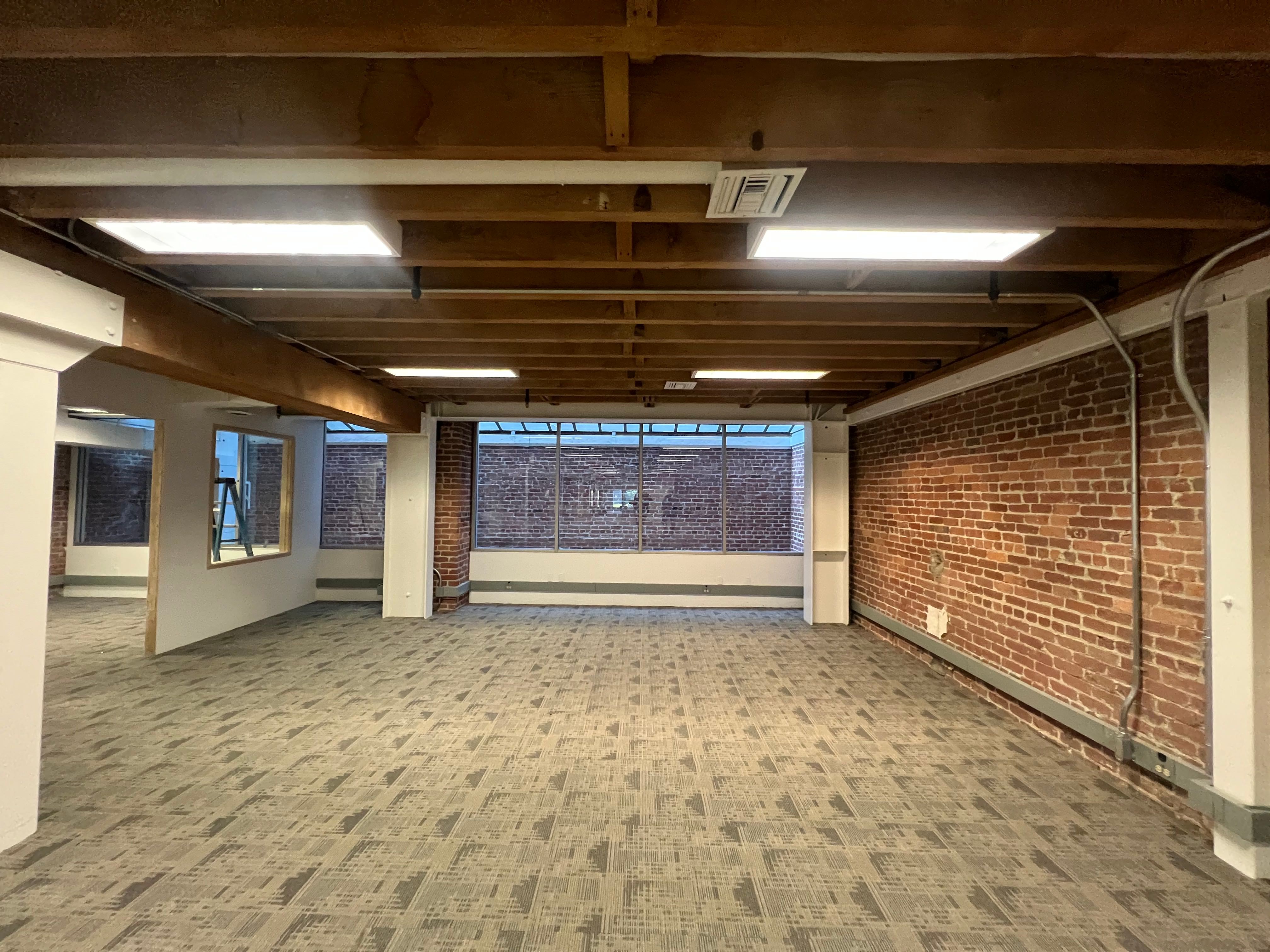 Boutique Brick-and-Timber Suite at the Heart of Jackson Square