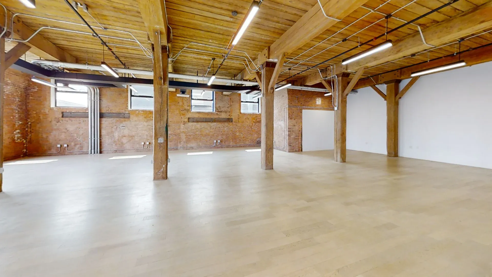 Airy Brooklyn Office with Exposed Brick and High Ceilings
