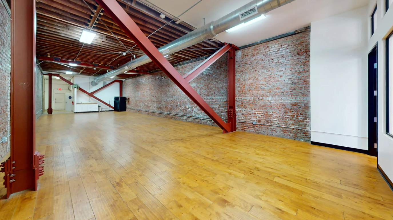 Chic Brick Office with Natural Light in Mid Market