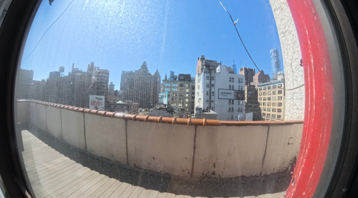 Bright SoHo Office with Natural Light and Greenery