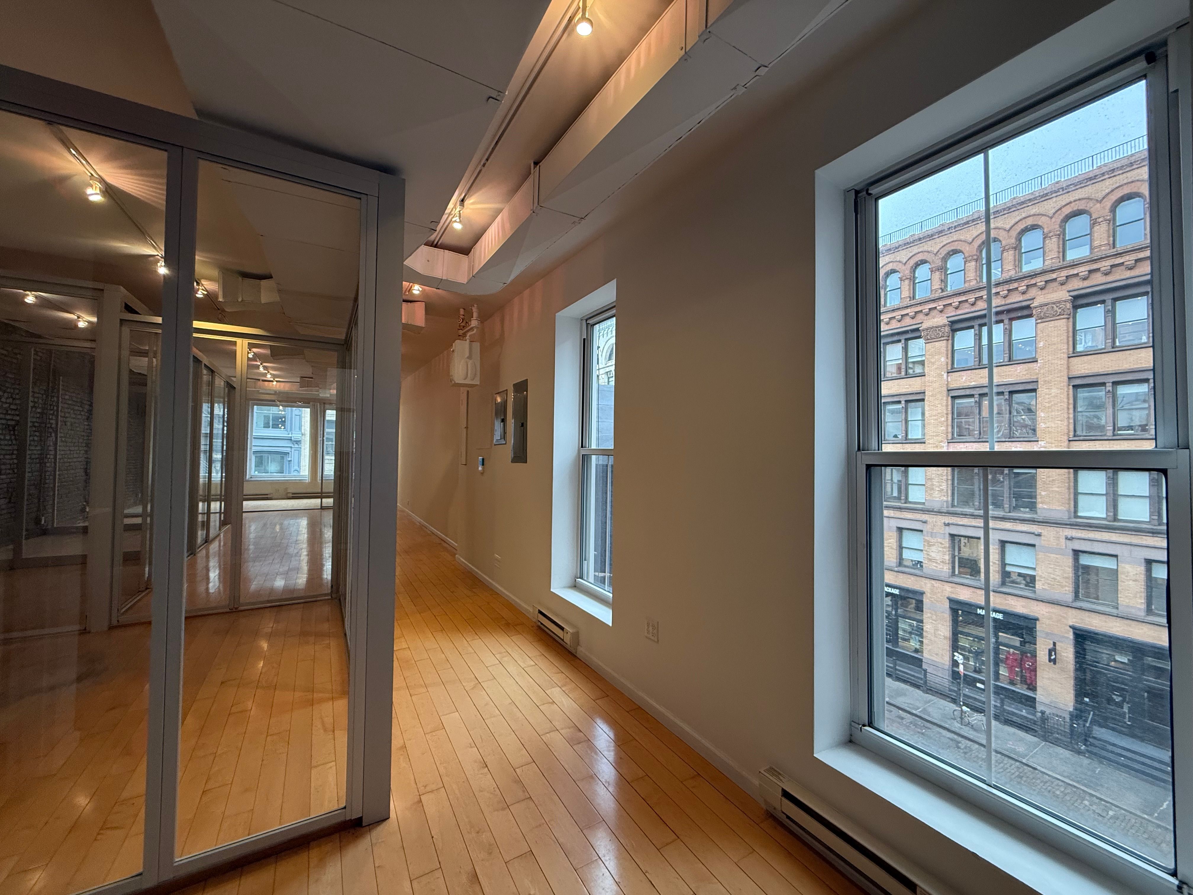 Inspired SoHo Loft Workspace with Radiant Windows