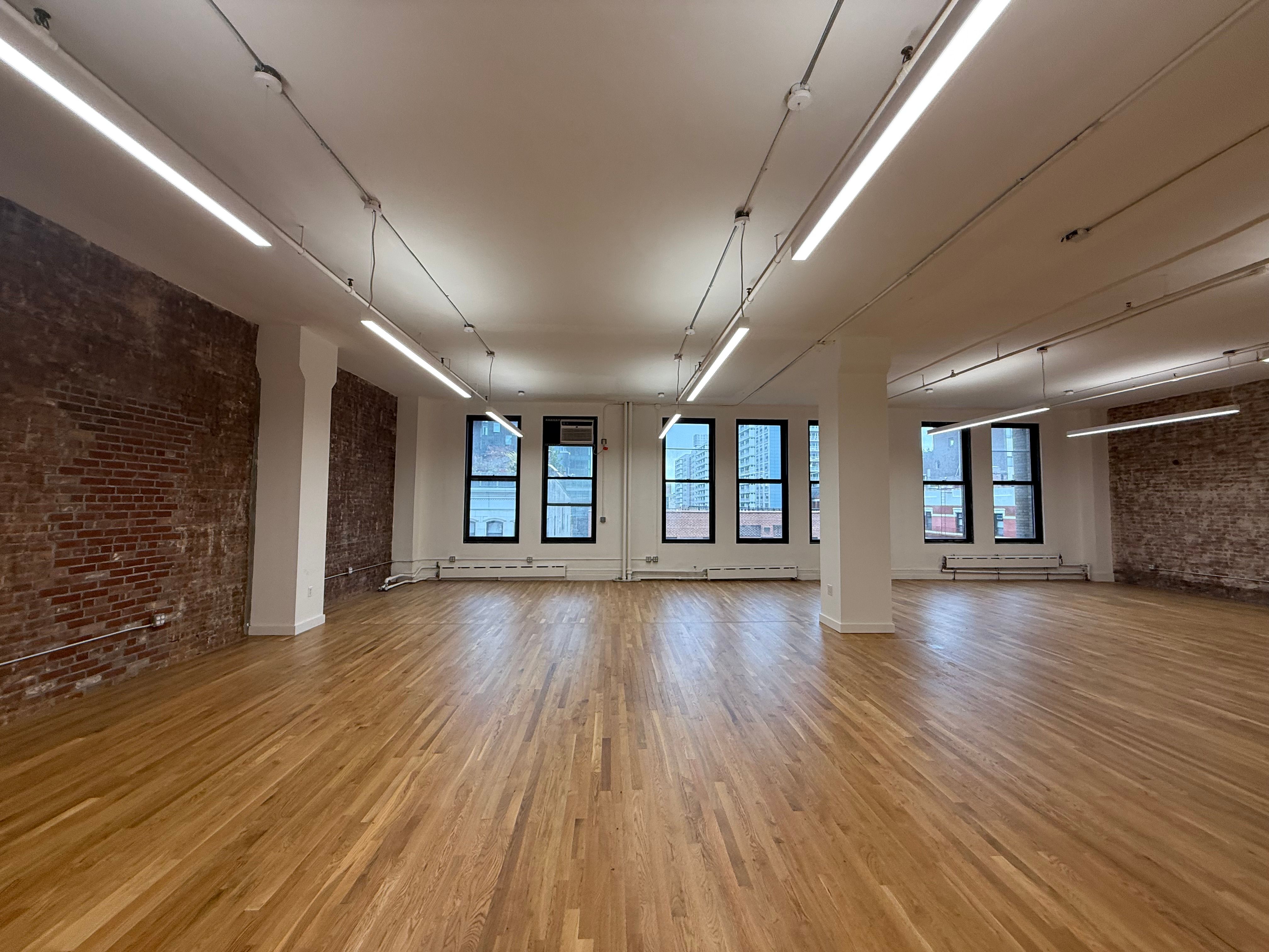Vibrant SoHo Office with Natural Light and Large Windows