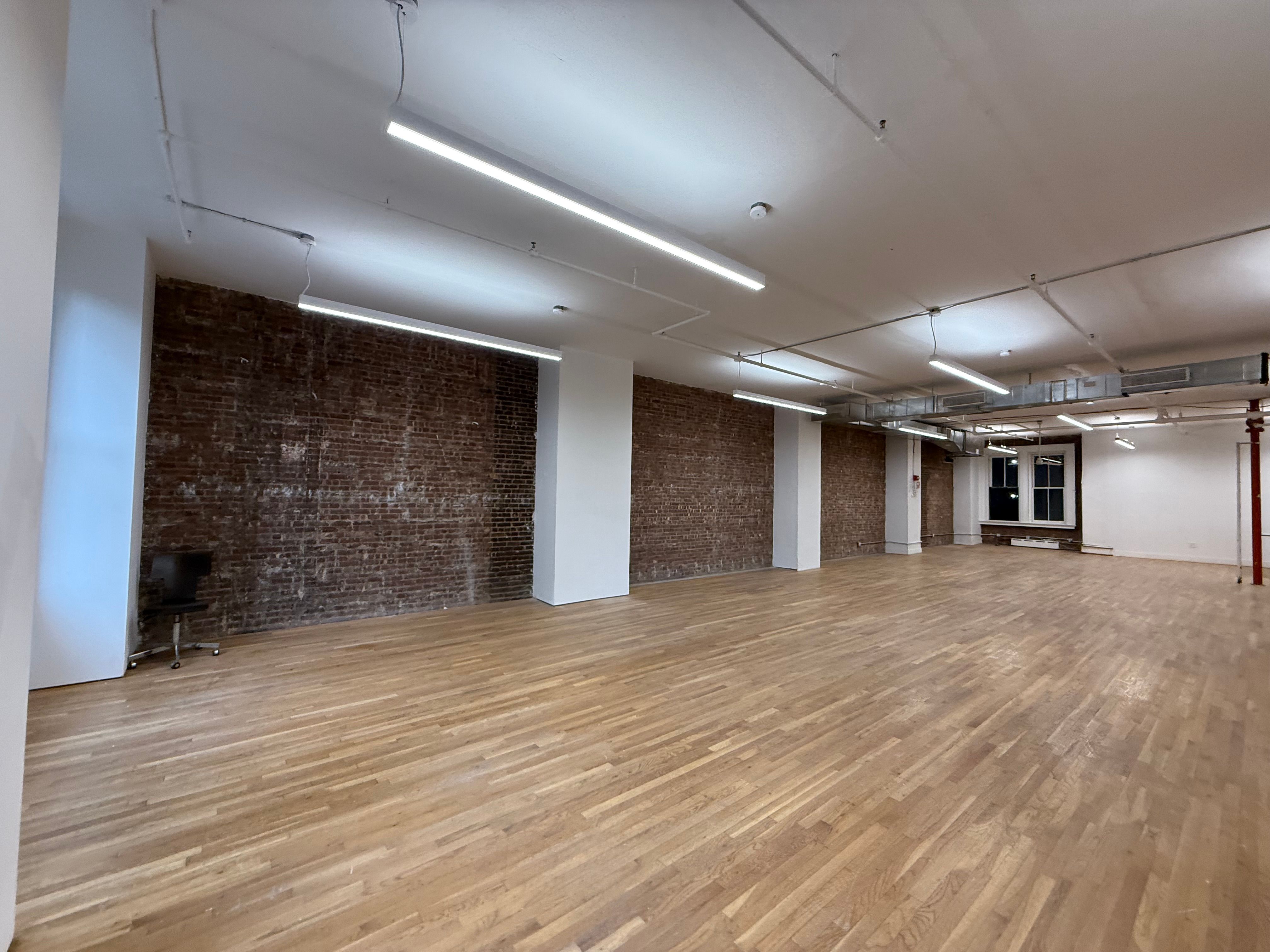 Chic Brick Office with Natural Light in NOHO