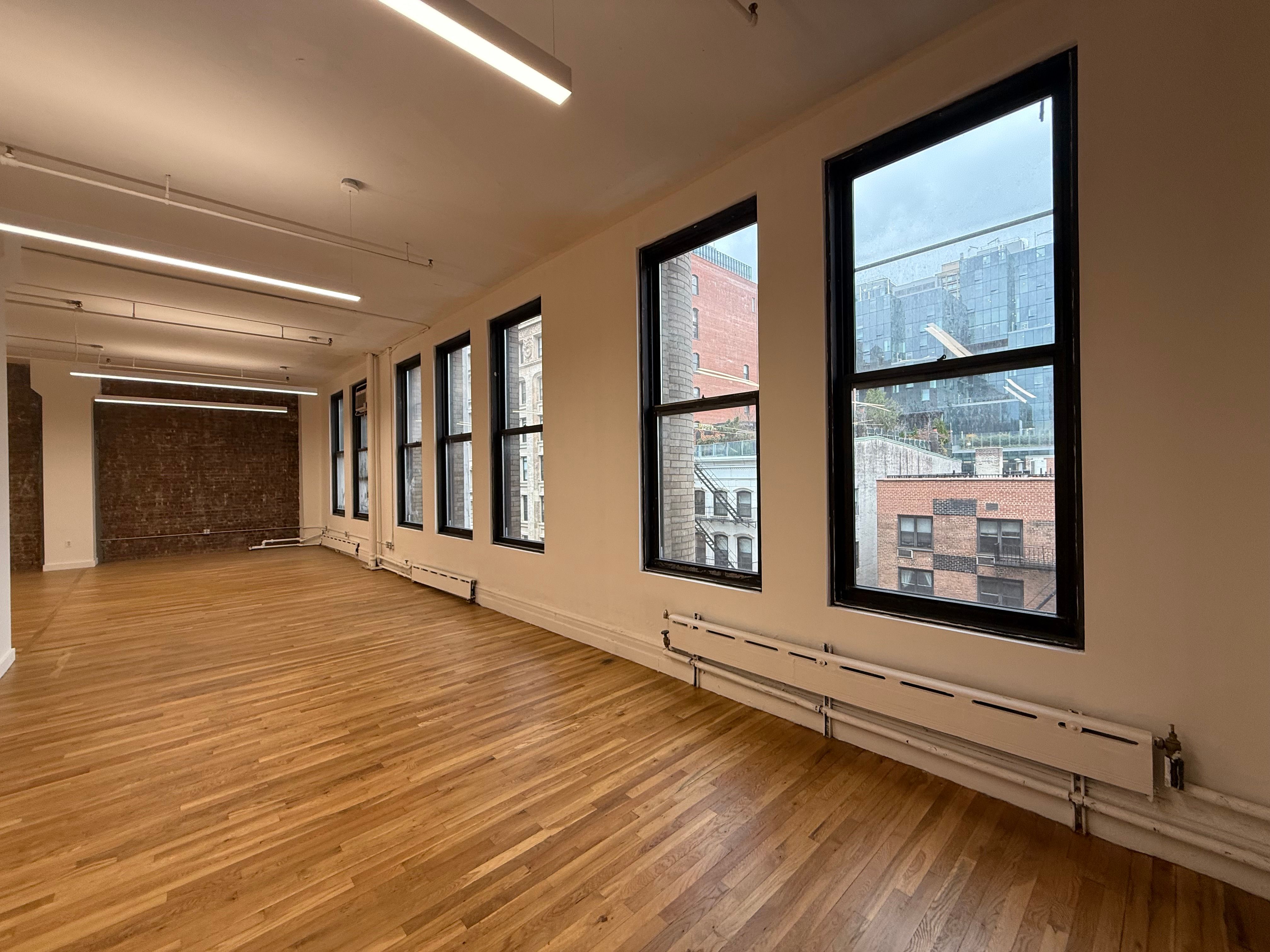 Vibrant SoHo Office with Natural Light and Large Windows
