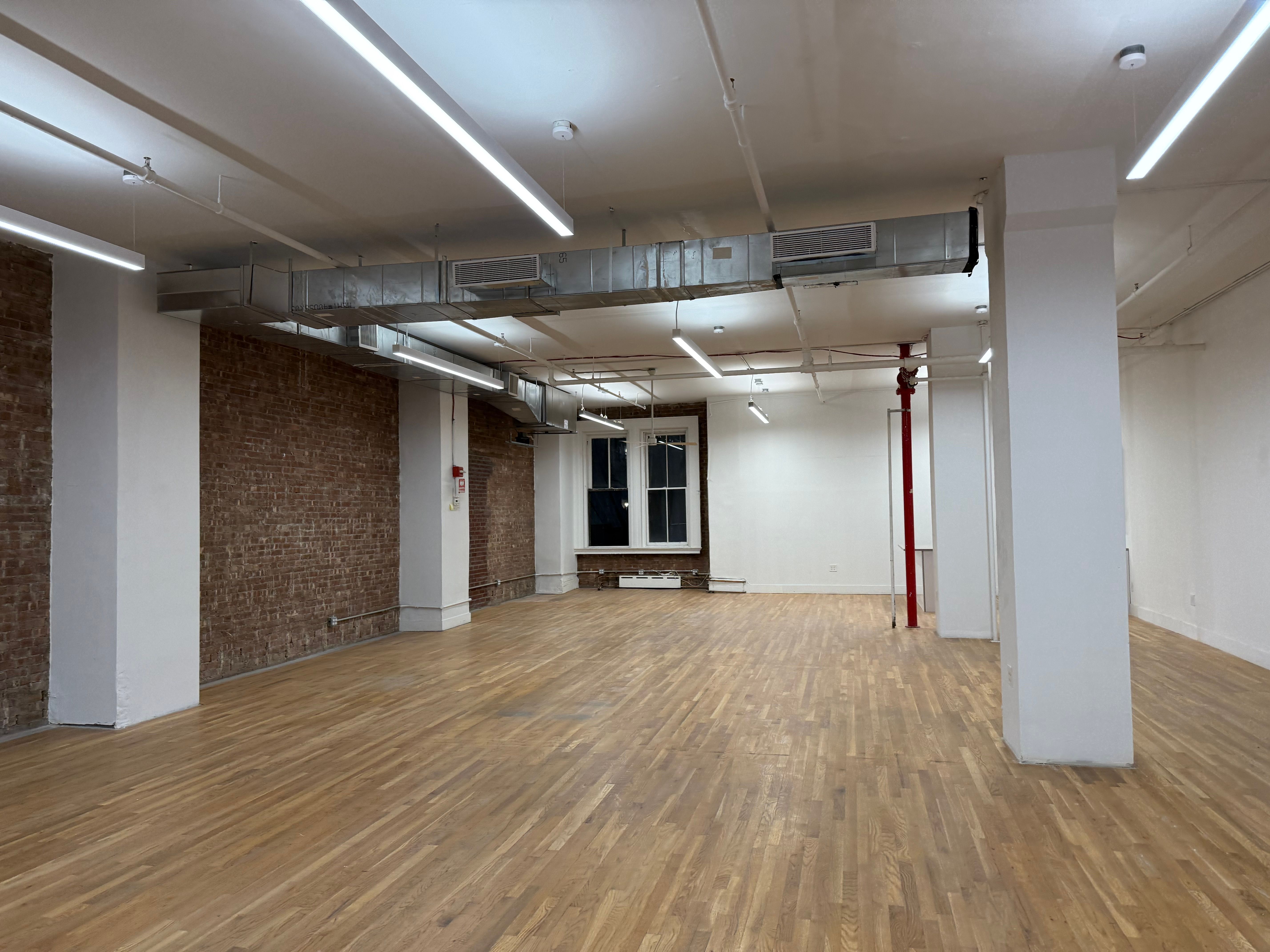 Chic Brick Office with Natural Light in NOHO