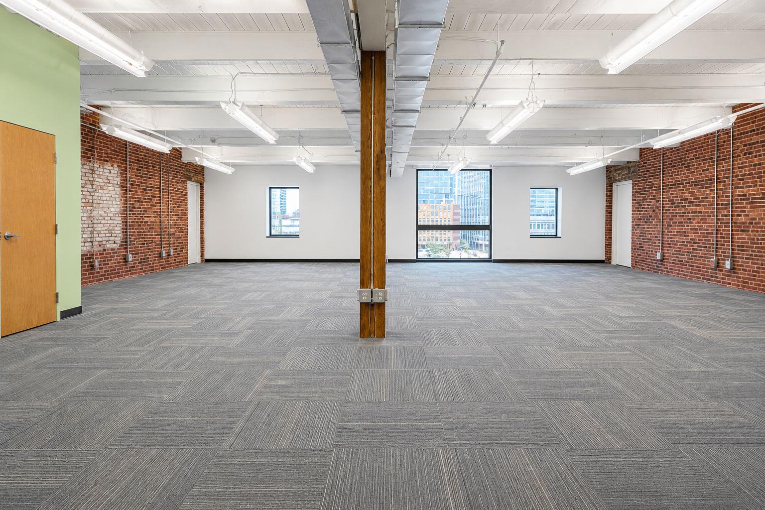 Vibrant Seaport Office with Exposed Brick and Light
