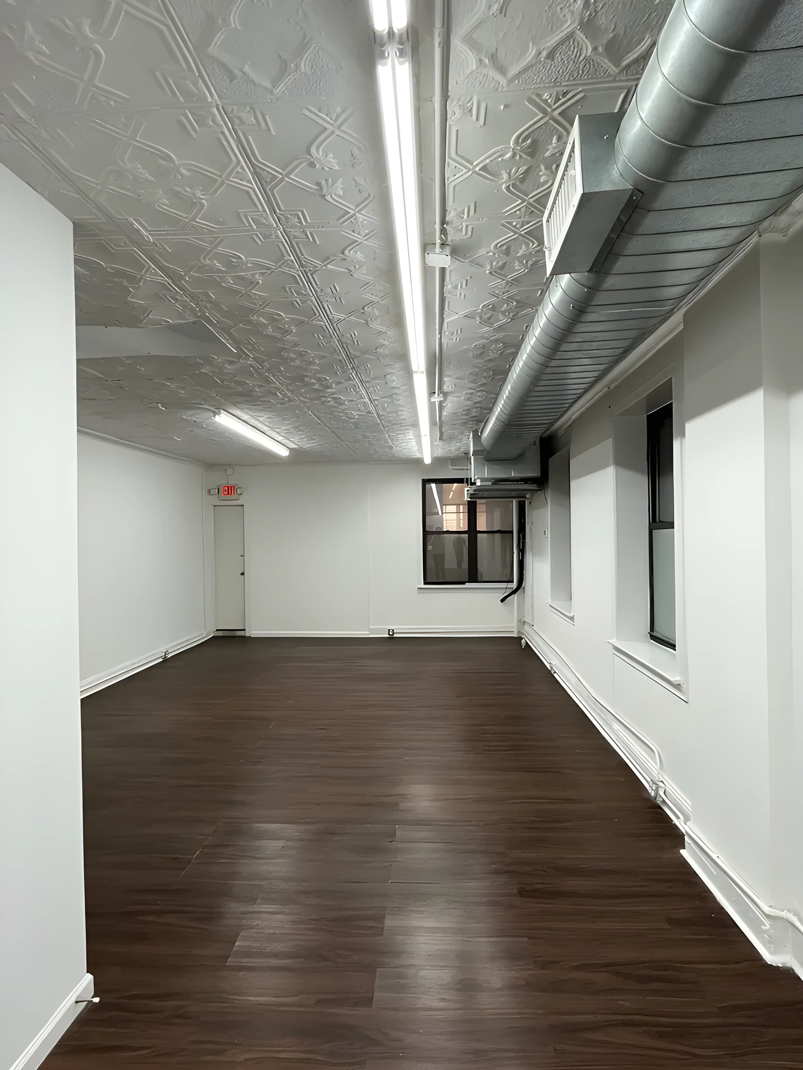 Airy Midtown Office with High Ceilings and Light