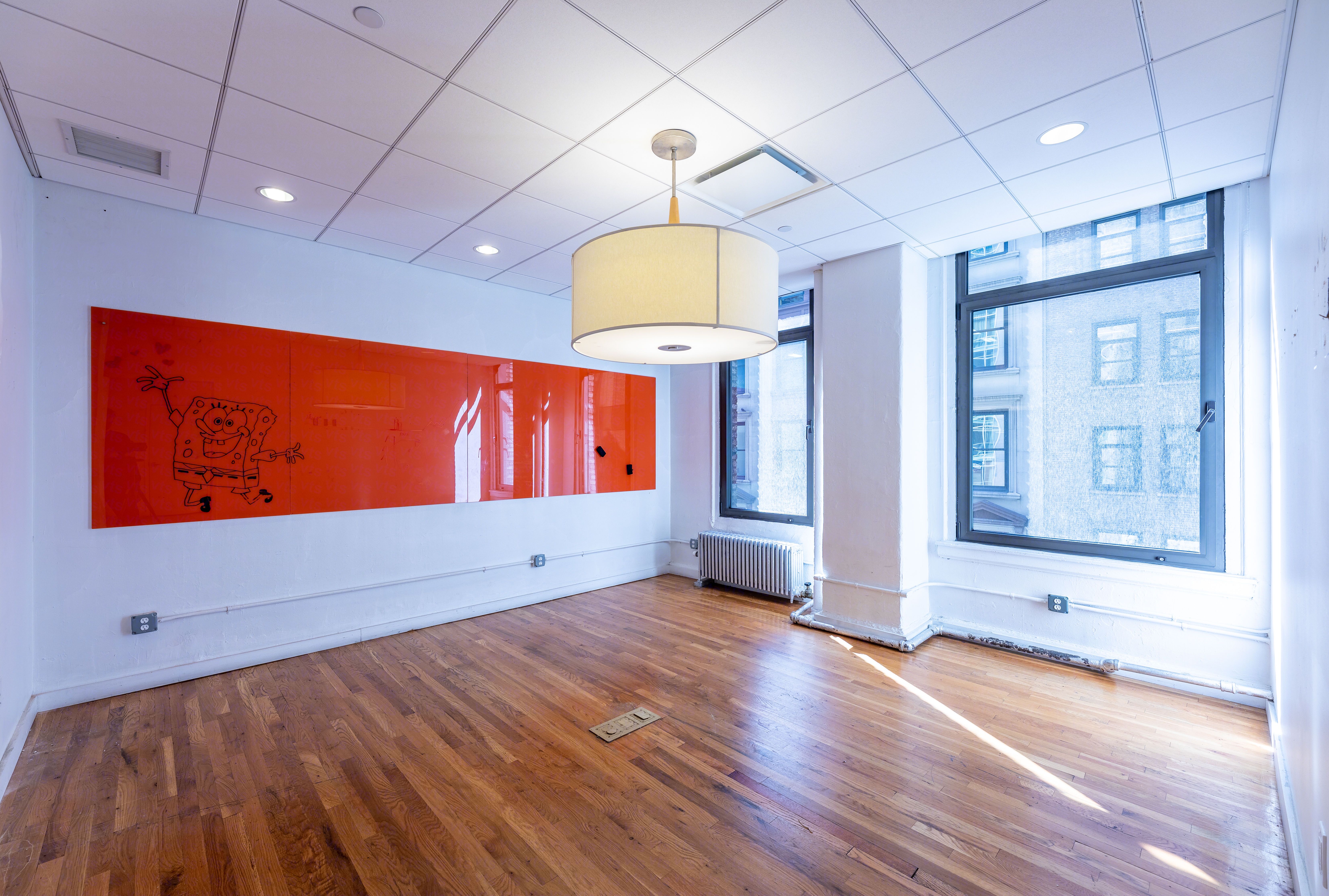 Airy Midtown Office with High Ceilings