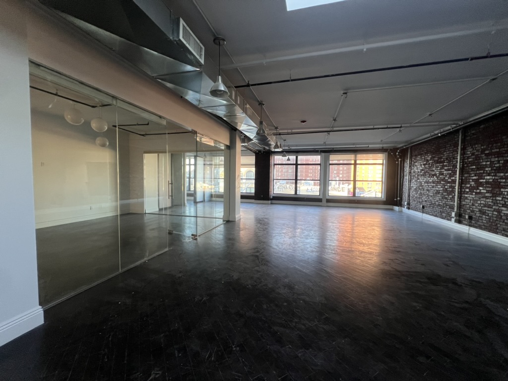 Penthouse Office with Skylights and Private Features in Chinatown