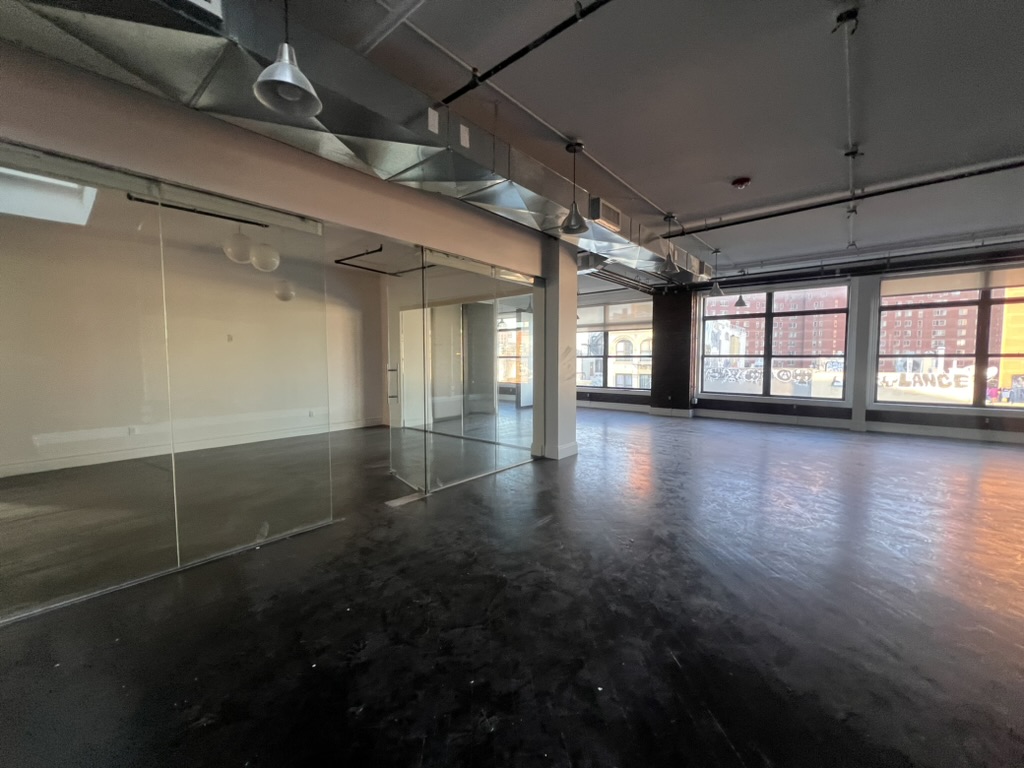 Penthouse Office with Skylights and Private Features in Chinatown