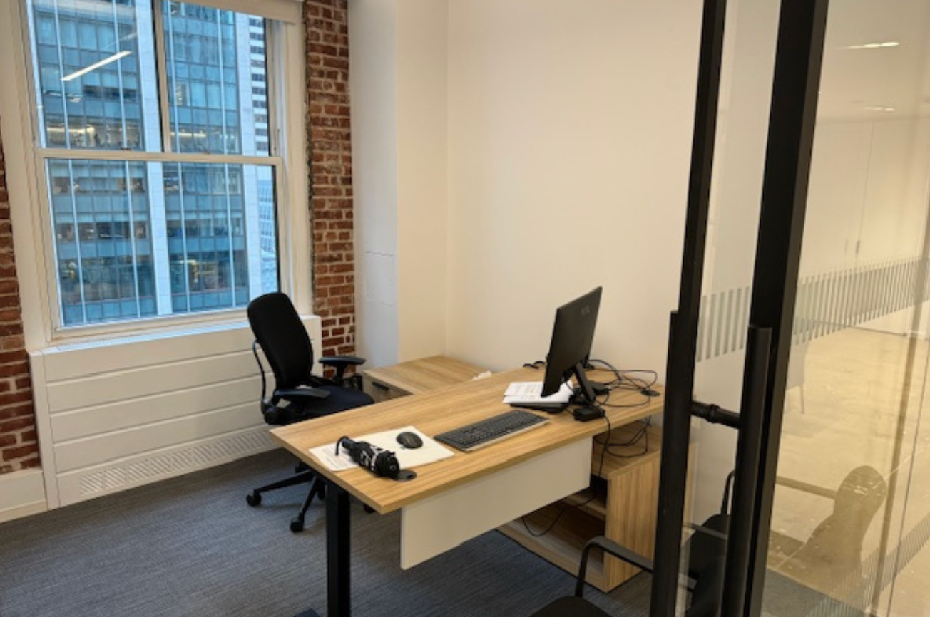 Vibrant Midtown Office with Exposed Brick and Light