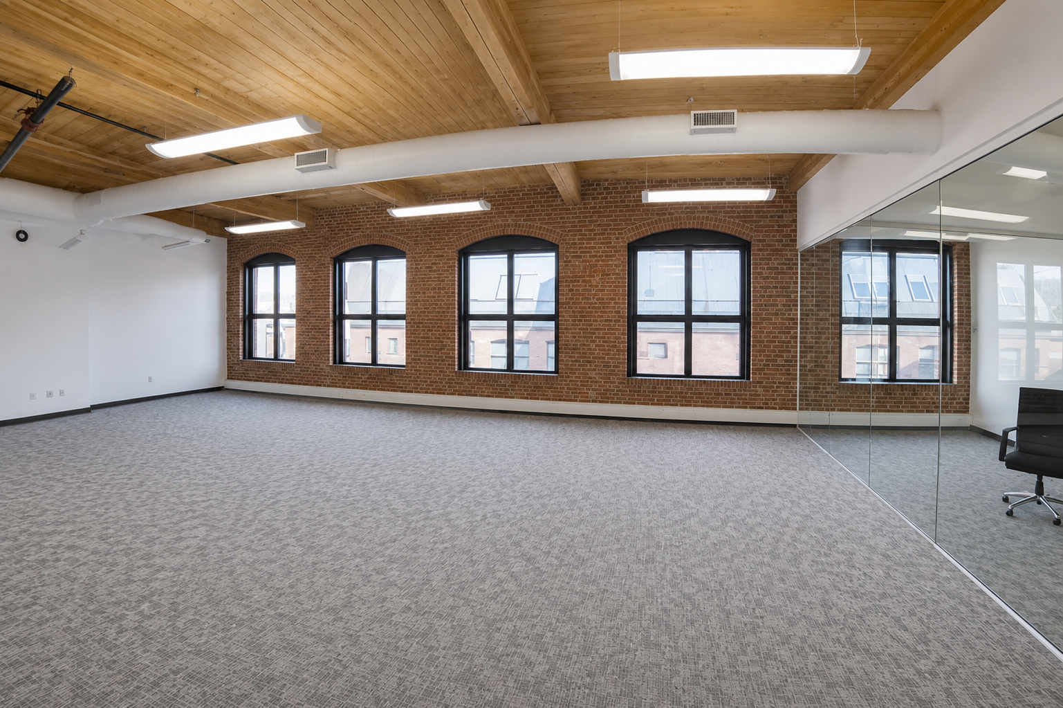 Creative Cambridge Space with Exposed Brick and High Ceilings