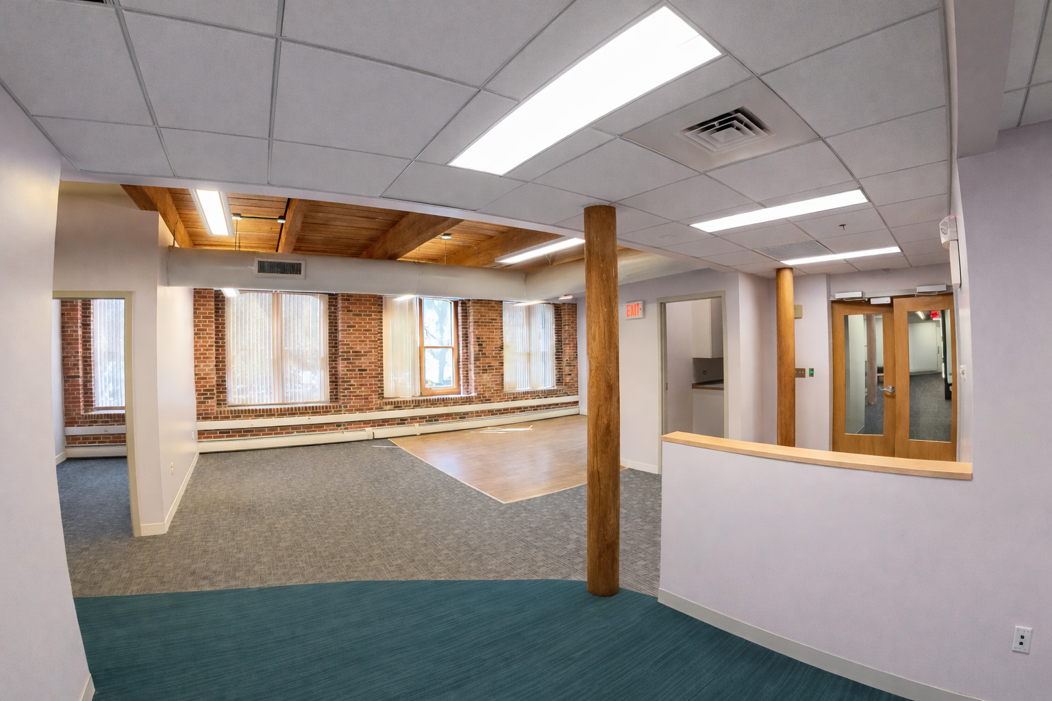 Light-Filled Office with Exposed Brick in East Cambridge