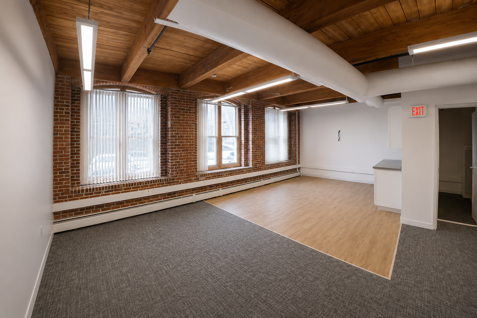 Light-Filled Office with Exposed Brick in East Cambridge