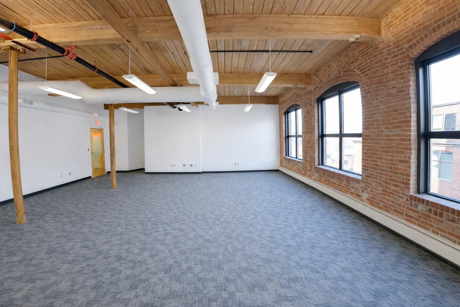 Creative Cambridge Space with Exposed Brick and High Ceilings