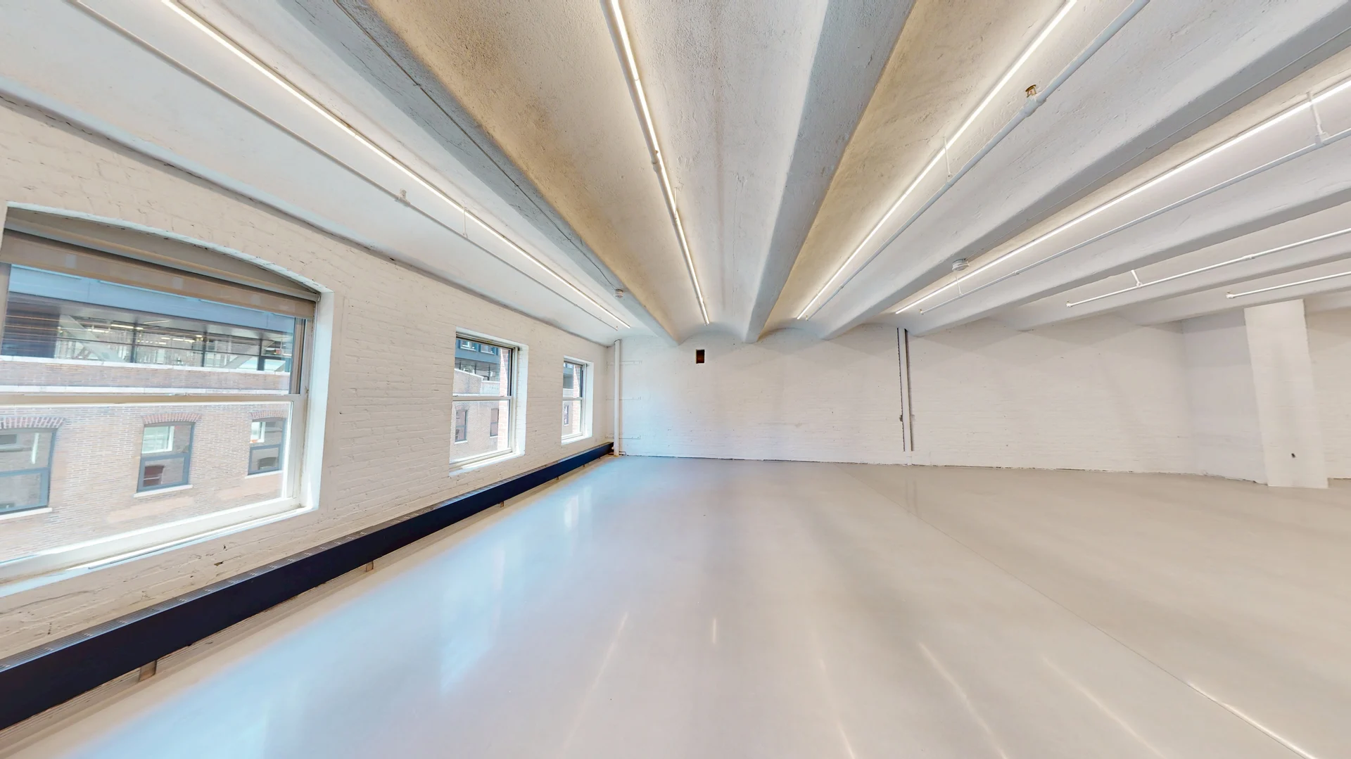 Creative Brick Office Space with Natural Light in Chelsea