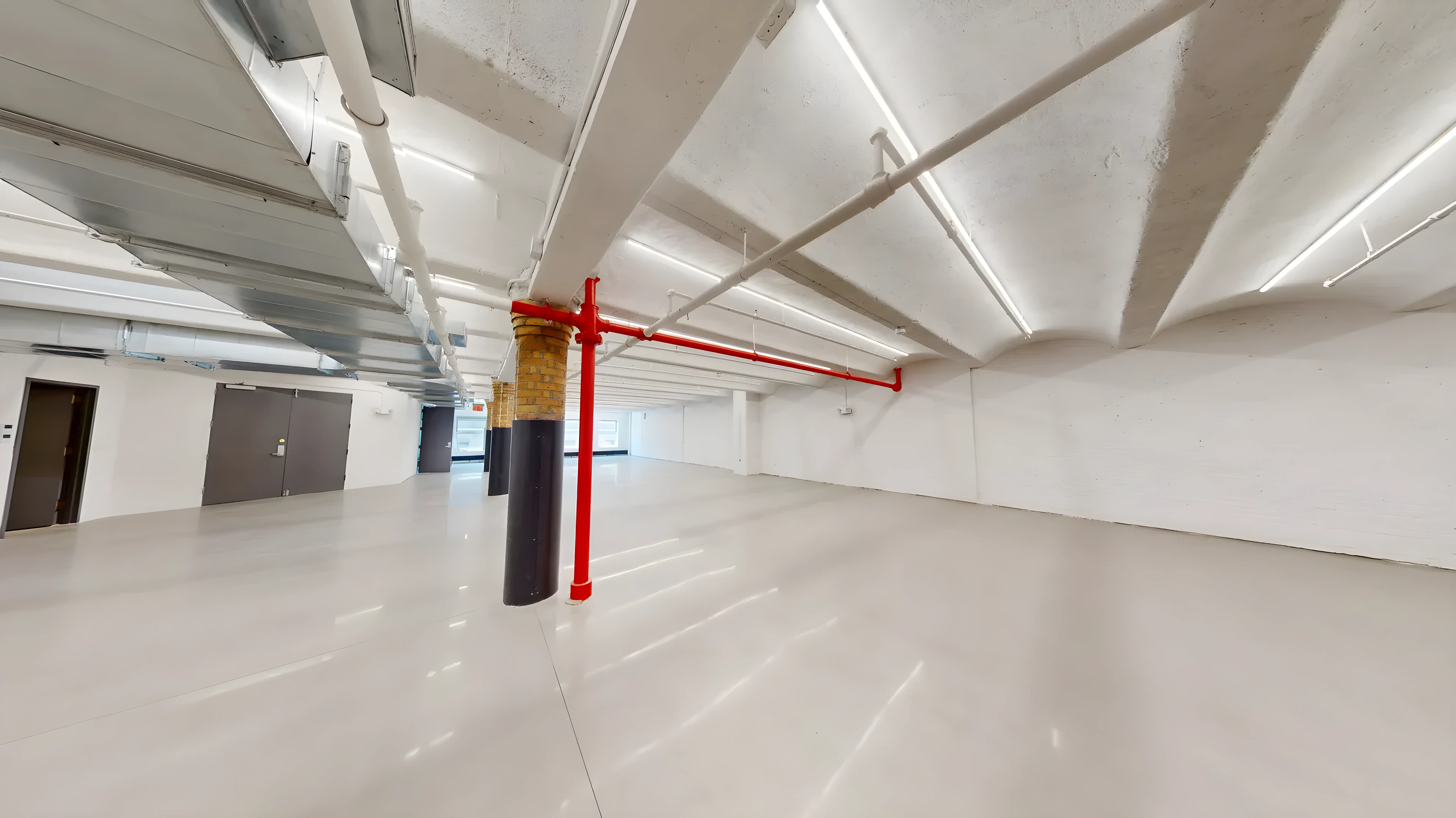 Creative Brick Office Space with Natural Light in Chelsea