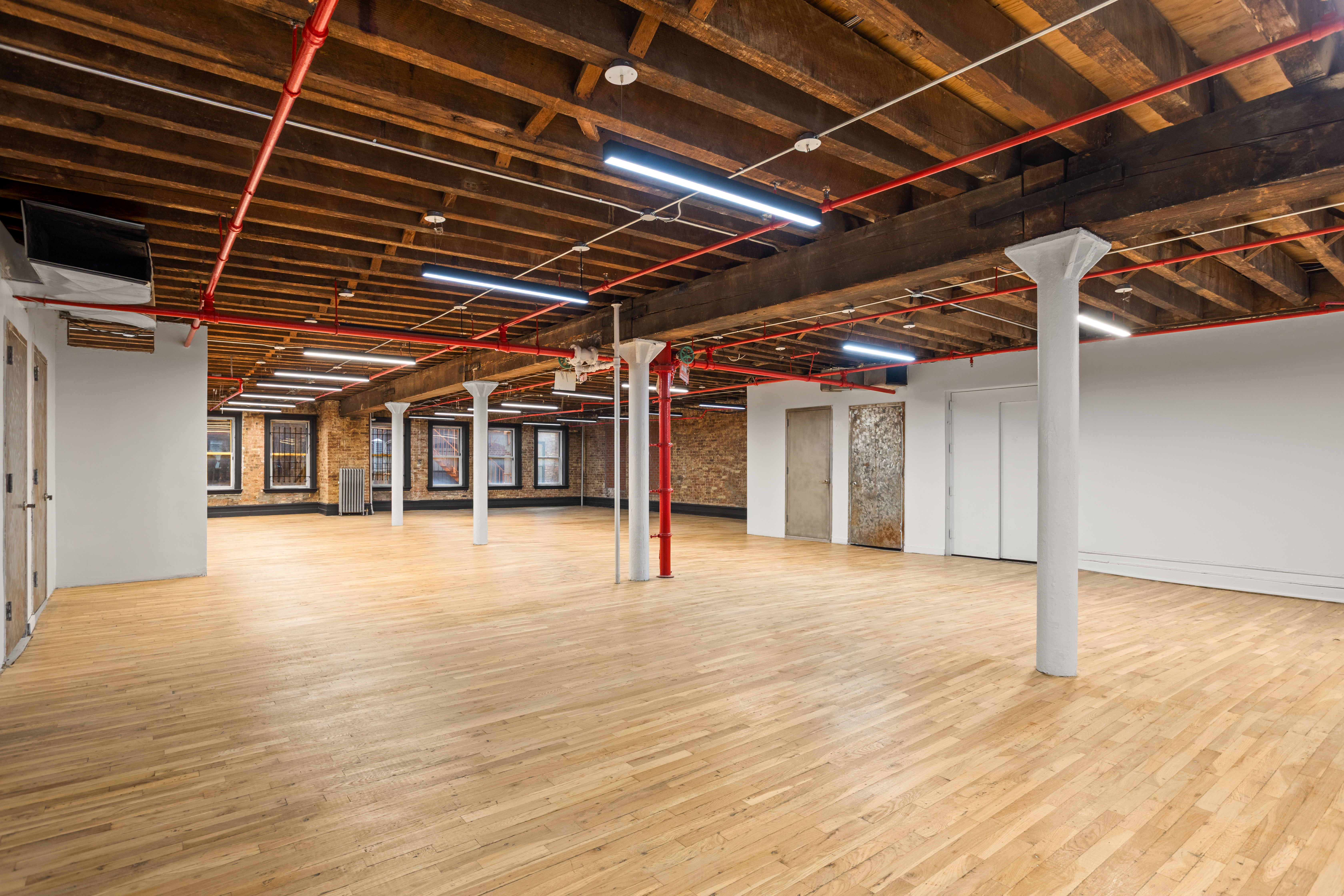 Chic Brick-Ceilinged Office in Vibrant Chelsea
