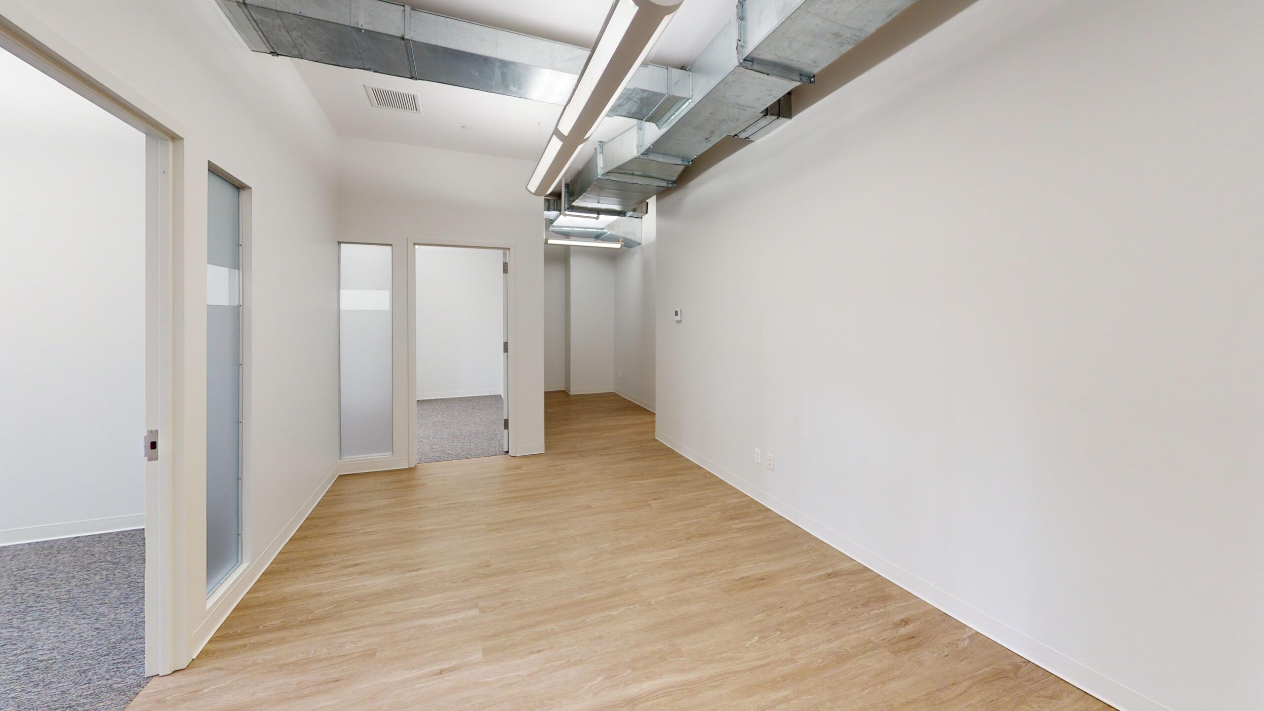 Bright FiDi Office with Natural Light and High Ceilings