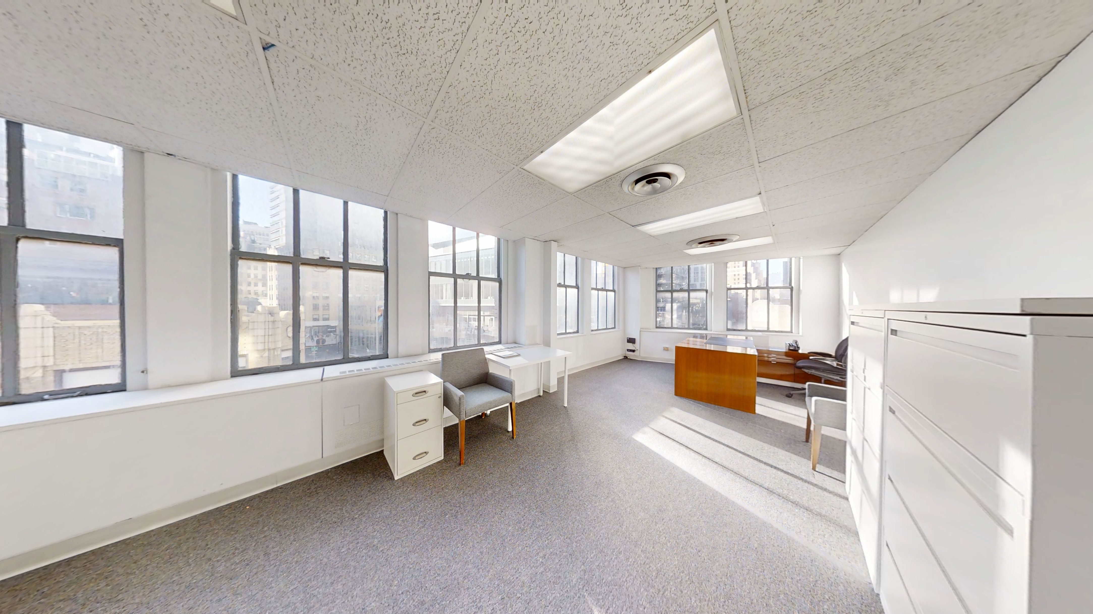 Spacious Office with Natural Light and Private Offices