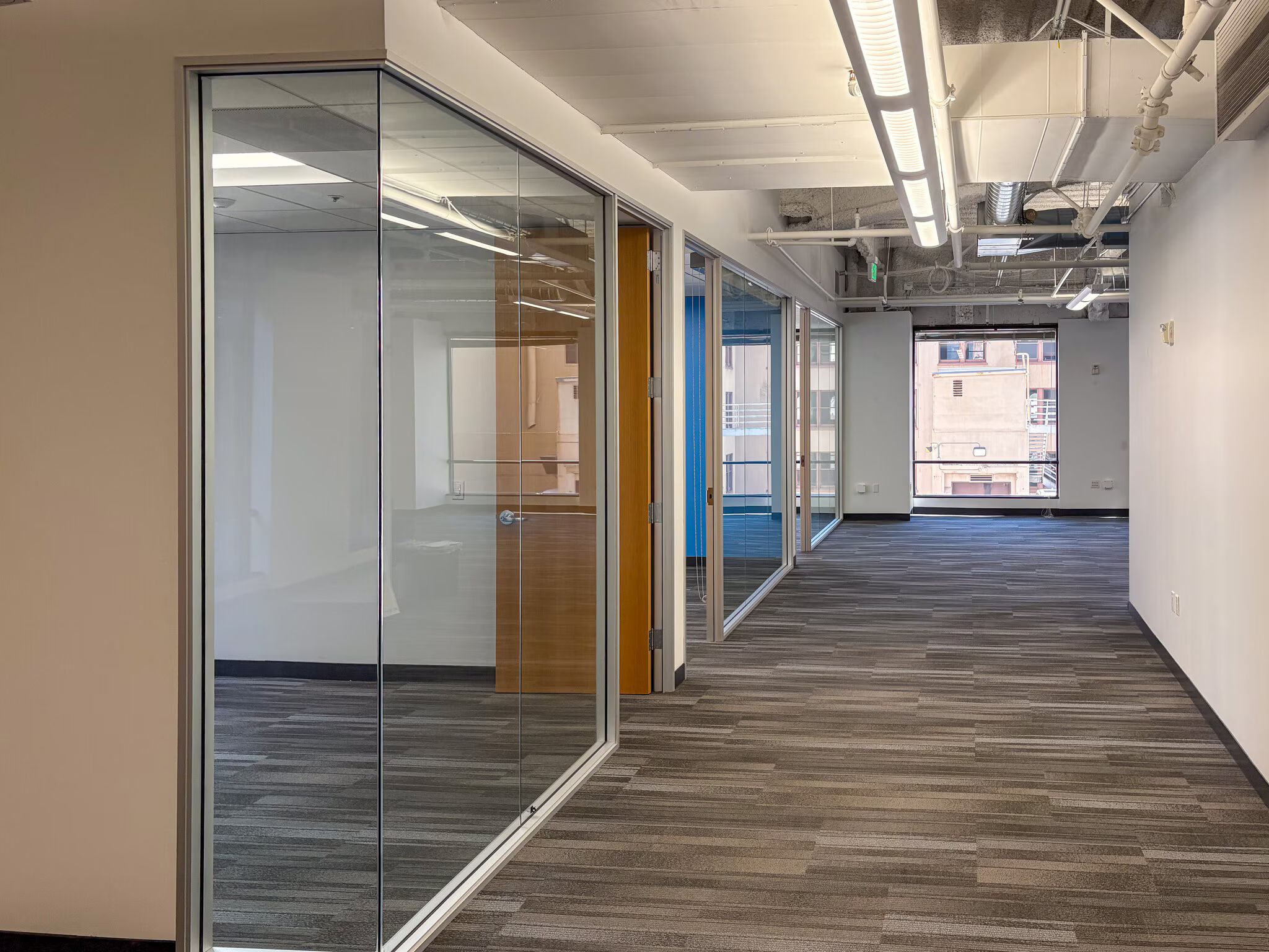 Stylish Urban Workspace with High Ceilings & Industrial Accent