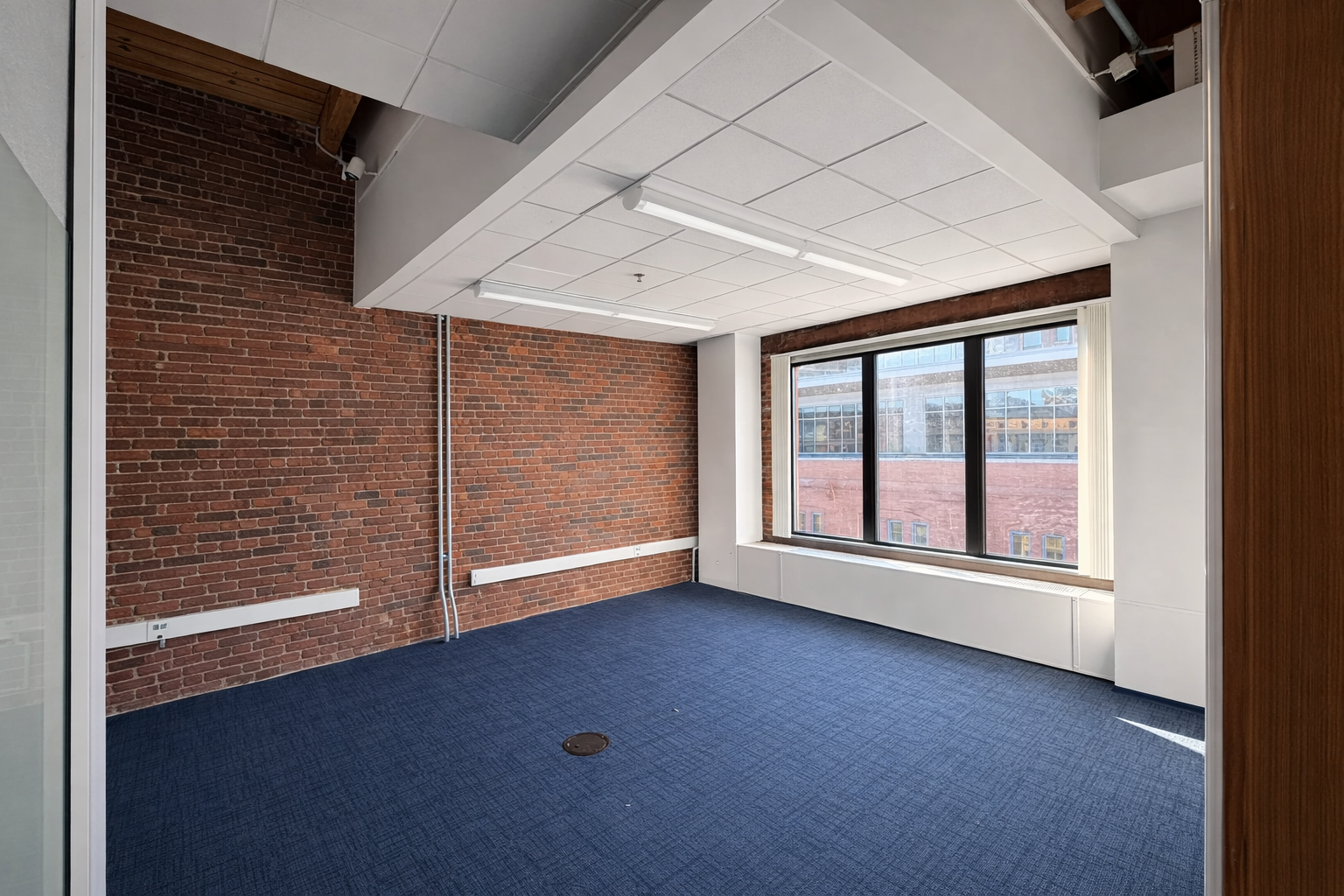 Bright Dynamic Office with Exposed Brick in Seaport