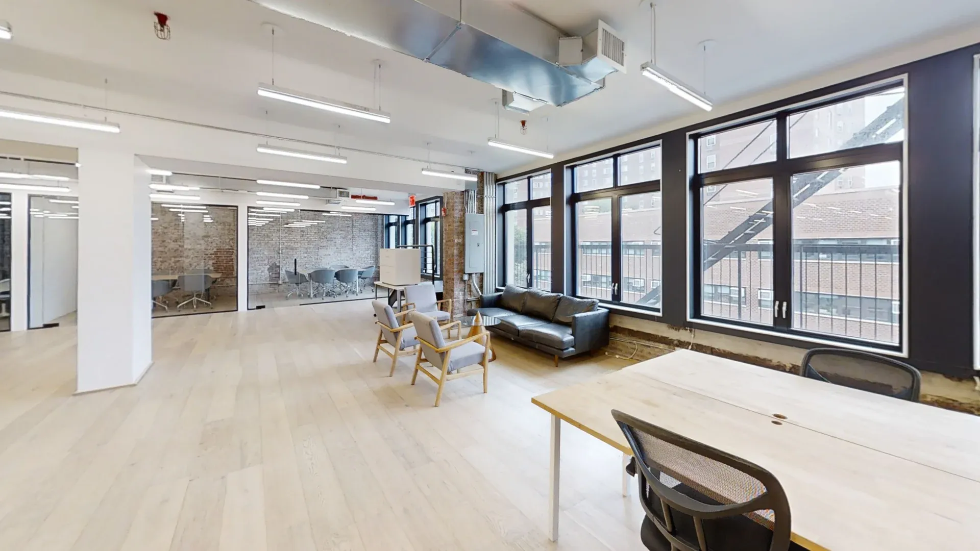 Bright Office with Exposed Brick in Chinatown