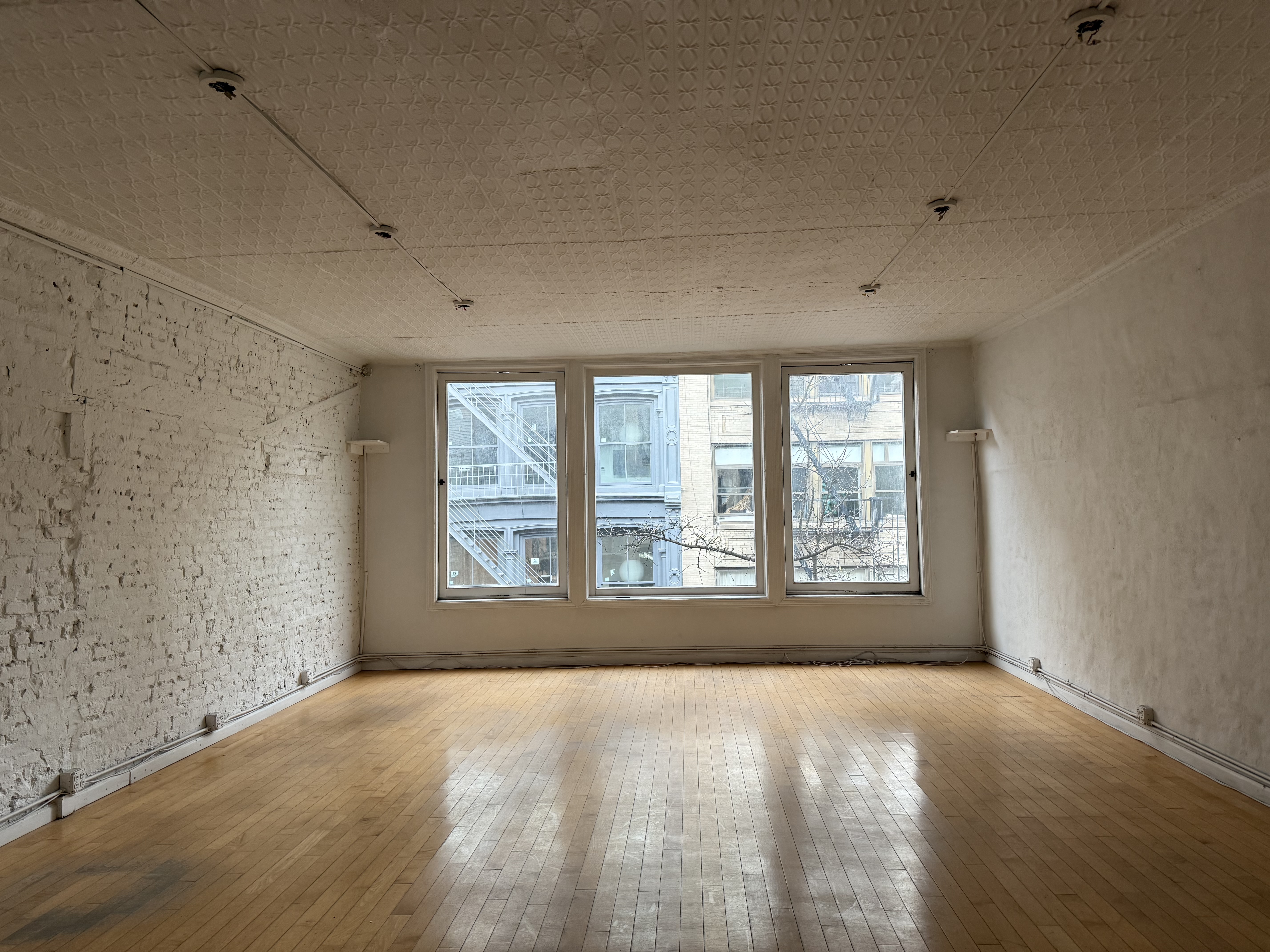 Inviting SoHo Office with Bright Corner Rooms