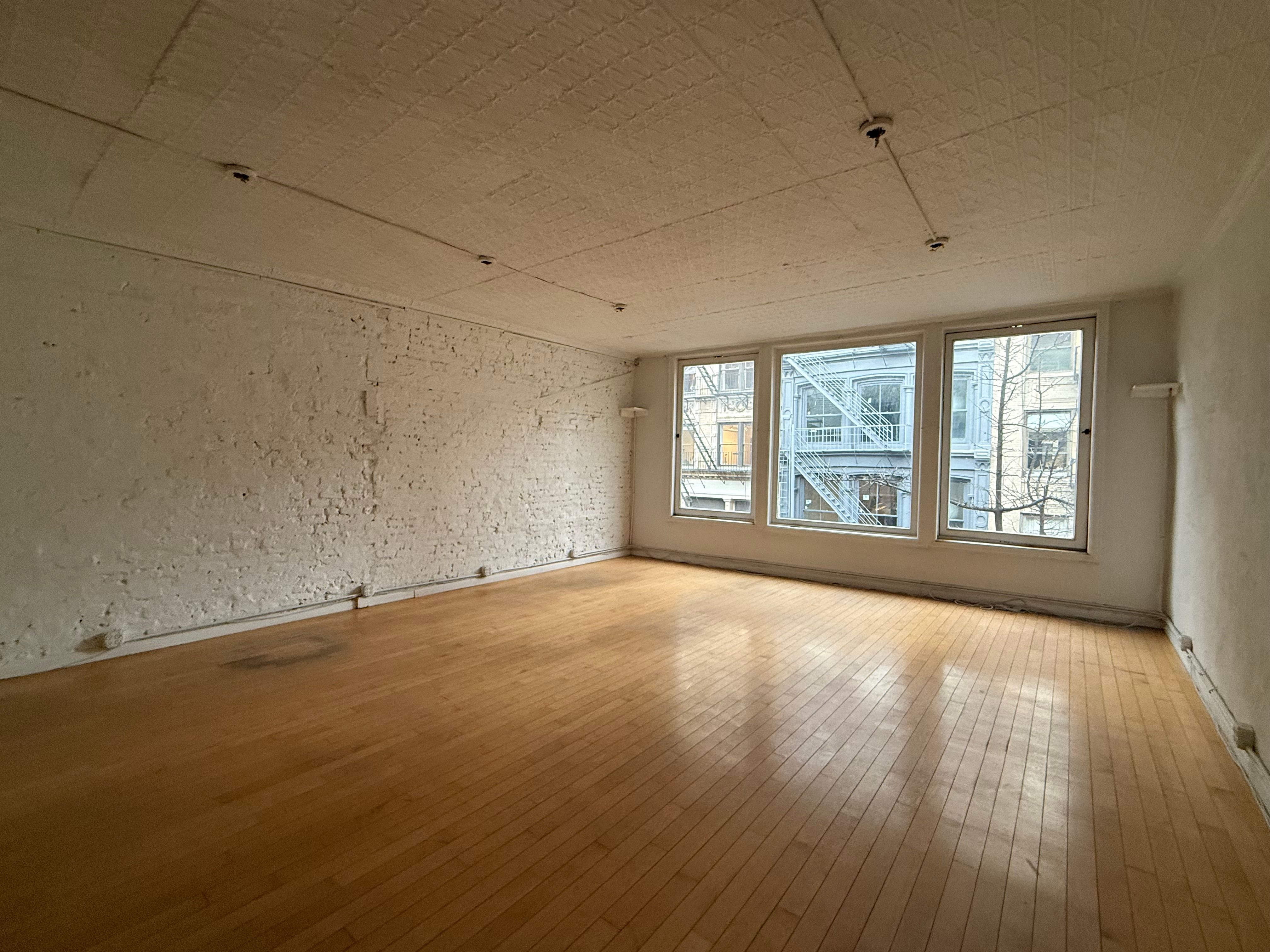 Inviting SoHo Office with Bright Corner Rooms